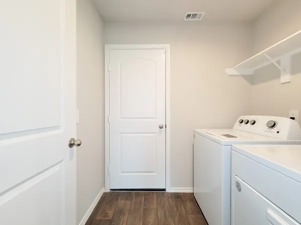 a utility room with dryer and washer