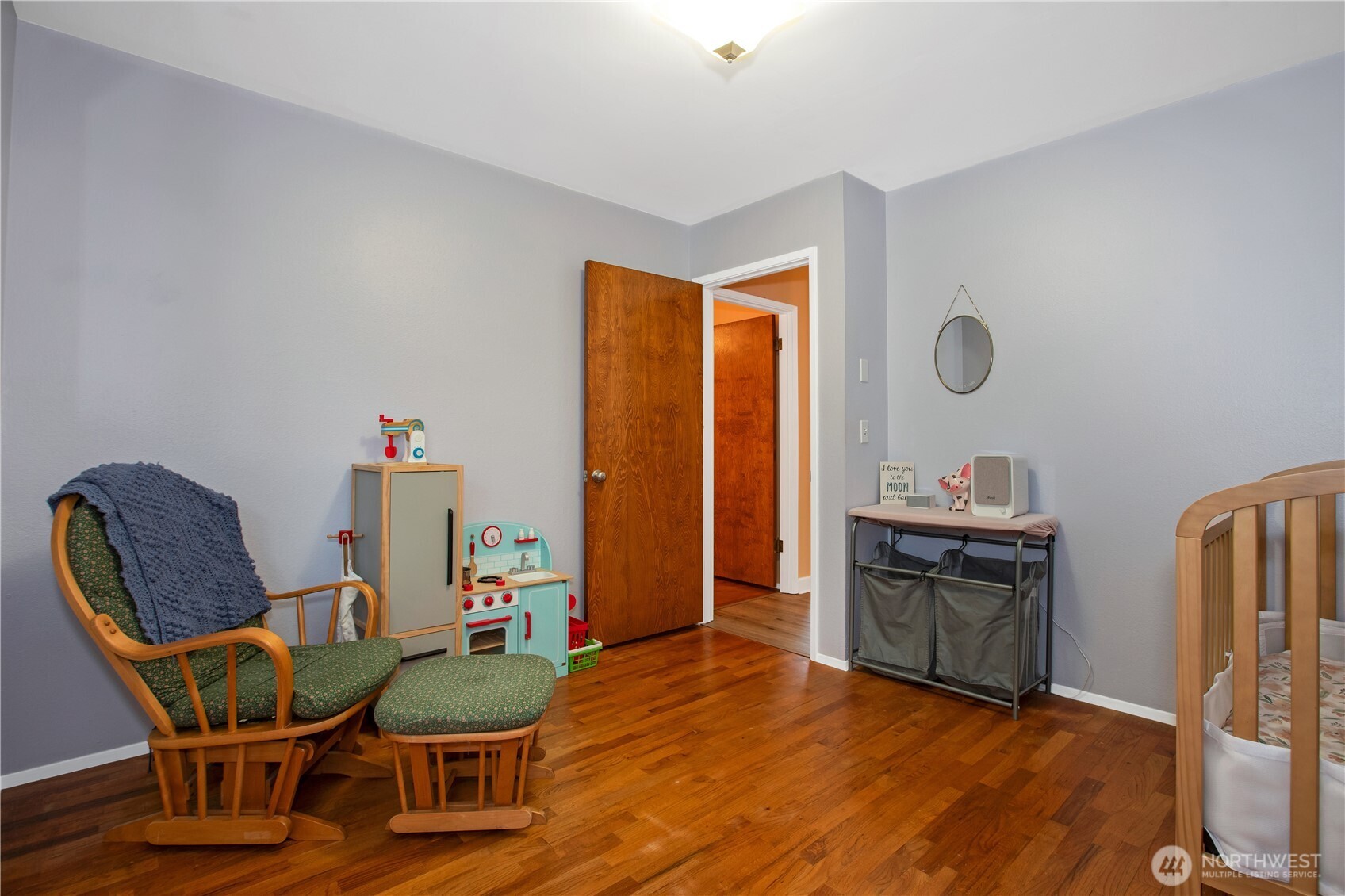311 Ranger Drive Southeast Lacey, WA 98503 - Photo 12 of 35 a dining room with furniture and wooden floor
