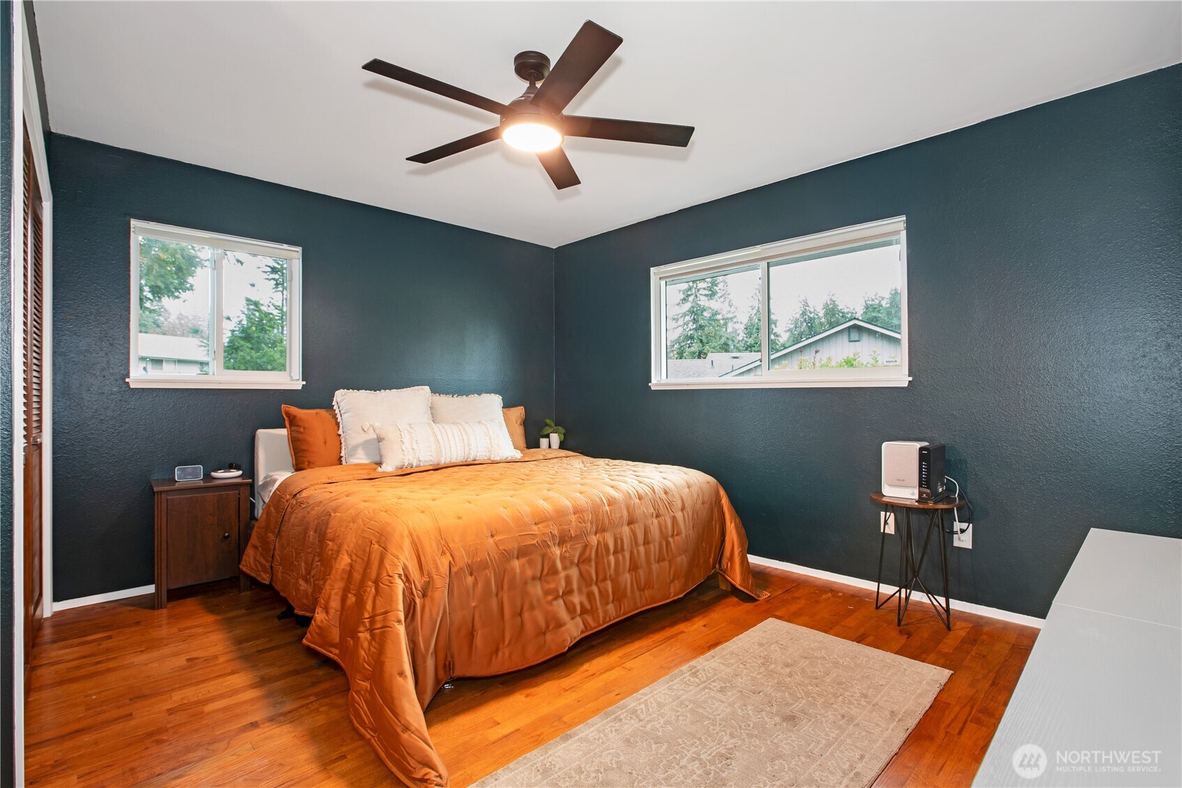 311 Ranger Drive Southeast Lacey, WA 98503 - Photo 15 of 35 a bed sitting in a bedroom next to a window