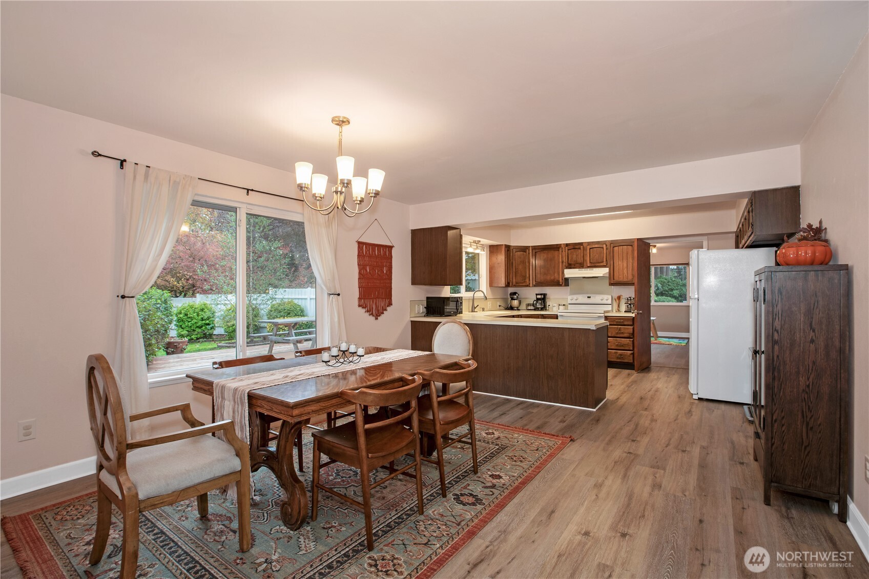 311 Ranger Drive Southeast Lacey, WA 98503 - Photo 21 of 35 a view of a dining room with furniture window and wooden floor