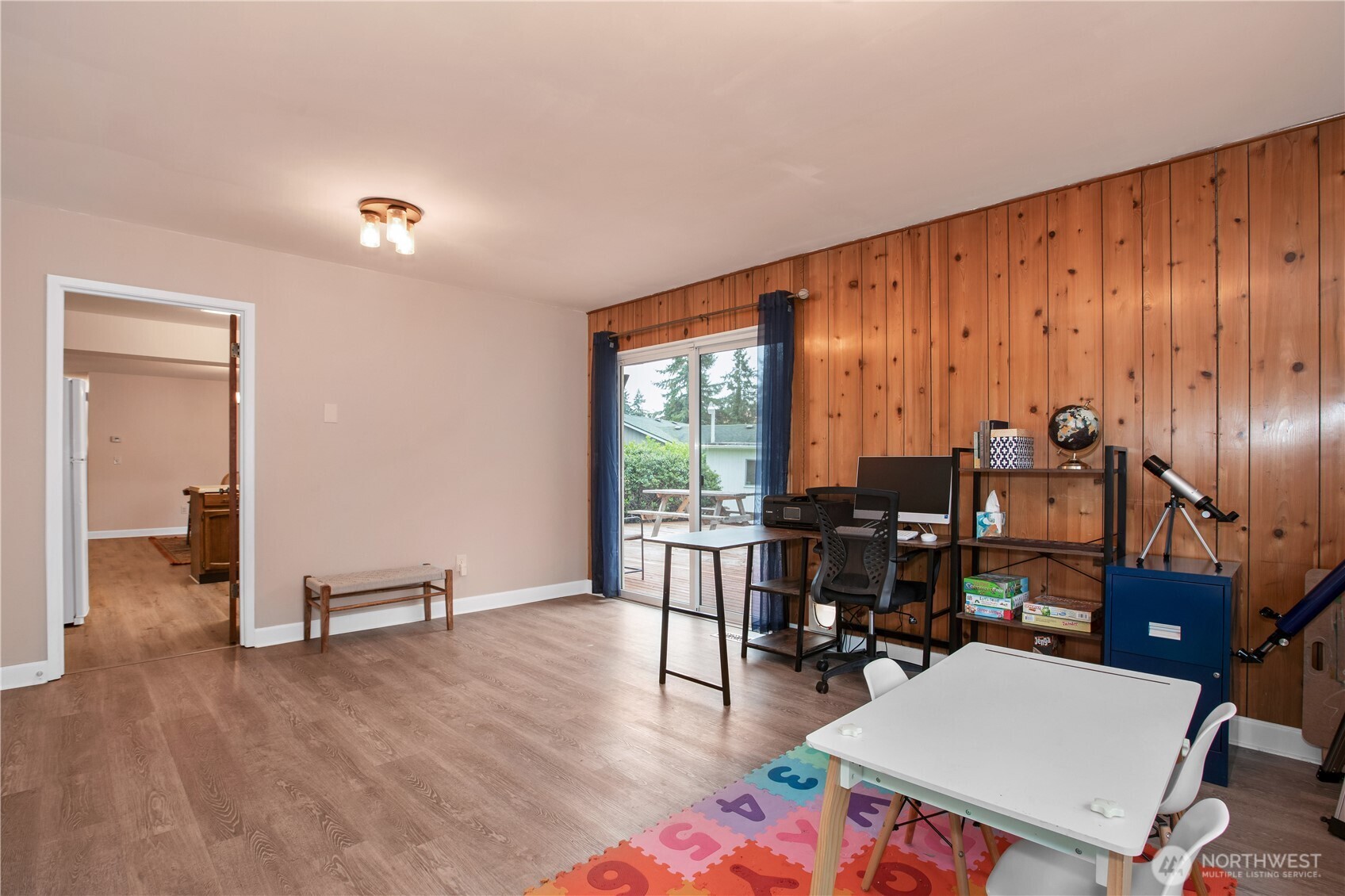 311 Ranger Drive Southeast Lacey, WA 98503 - Photo 25 of 35 a living room with furniture and large windows
