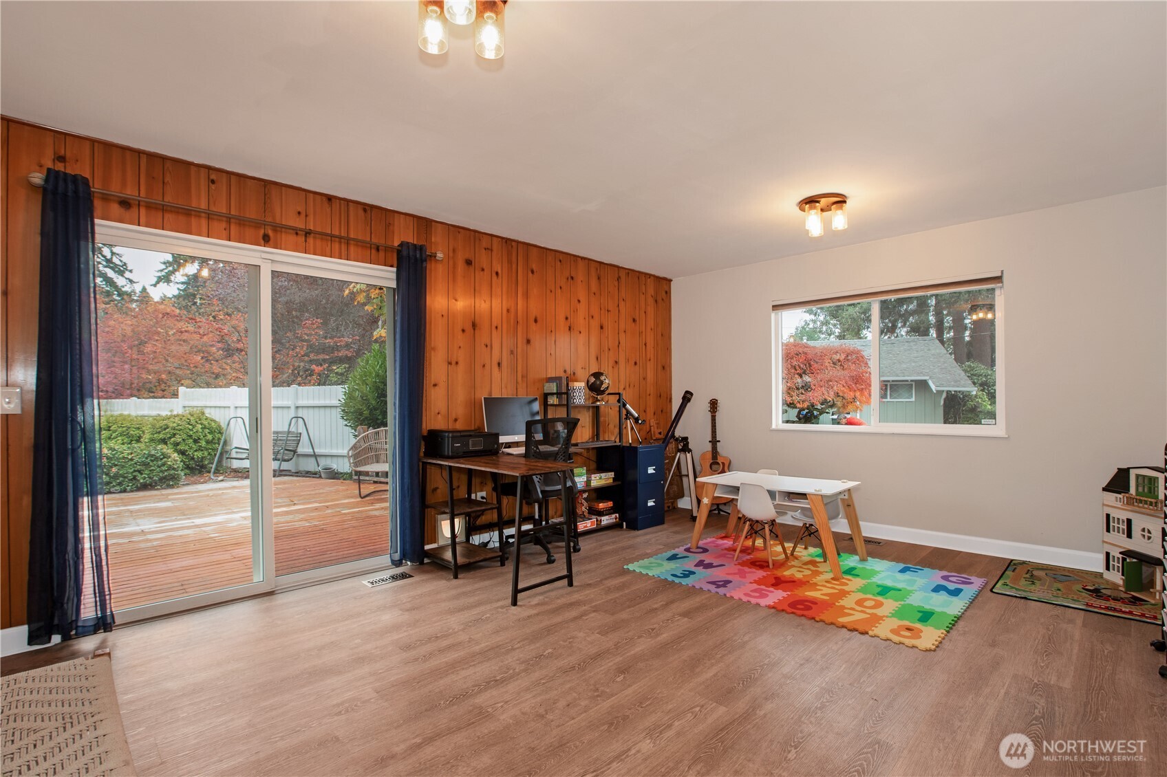 311 Ranger Drive Southeast Lacey, WA 98503 - Photo 26 of 35 a living room with furniture and wooden floor