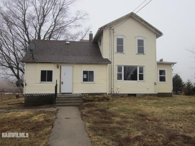 23182 Argo Fay Route Chadwick, IL 61014 - Photo 1 of 25 a view of a white house with a yard