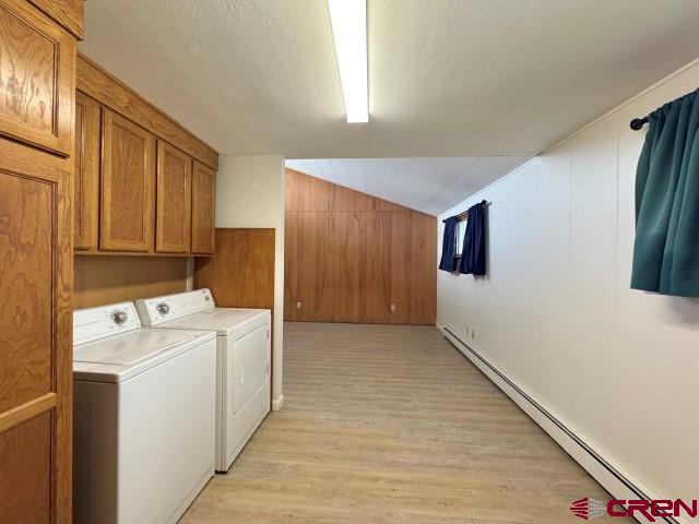1221 First Street Alamosa, CO 81101 - Photo 13 of 40 a utility room with dryer and washer