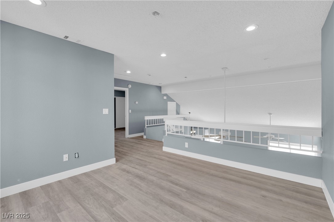 2716 Knightsbridge Road Henderson, NV 89074 - Photo 10 of 27 Unfurnished room with recessed lighting and light wood-style floors