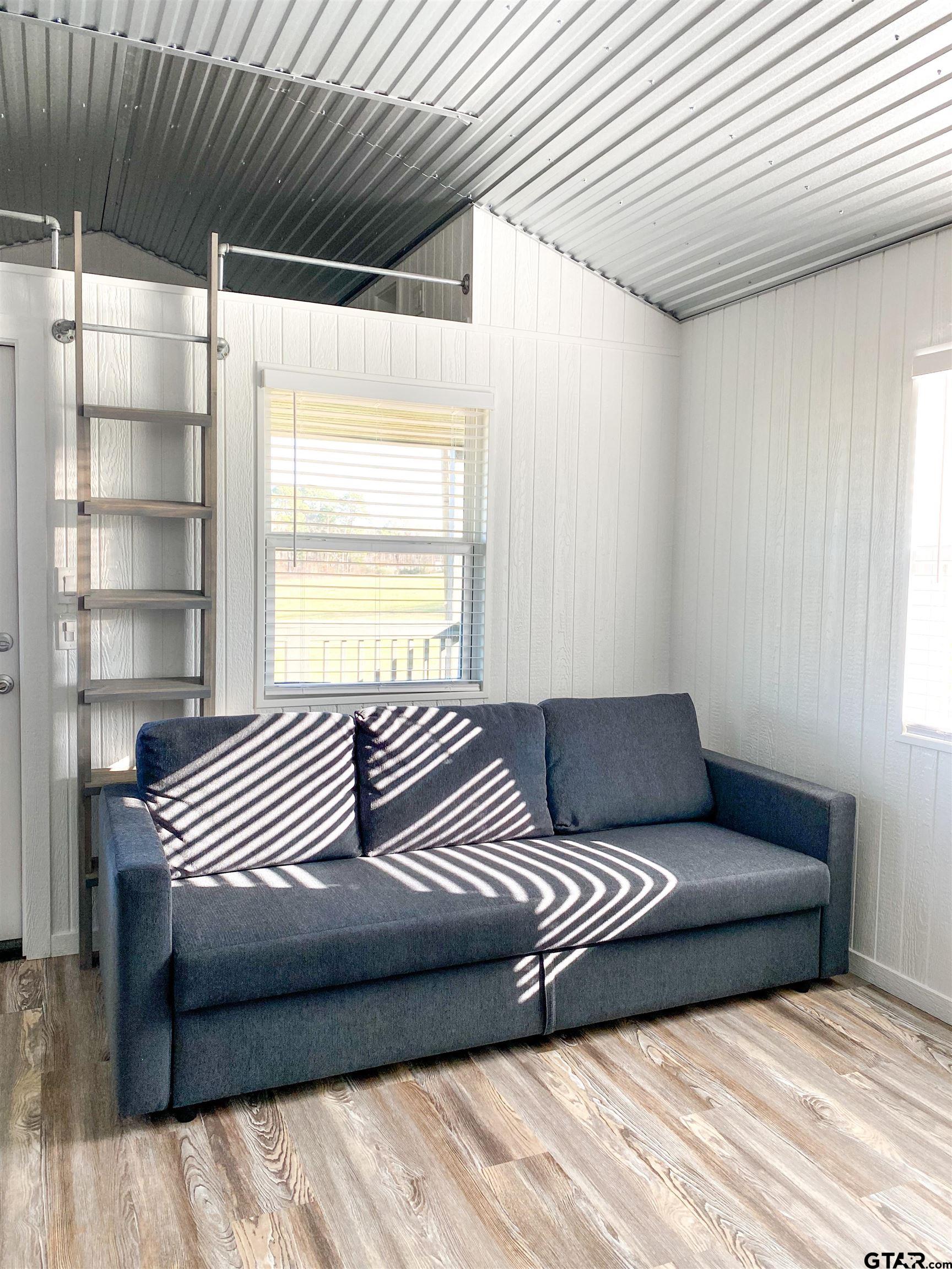 10864 State Highway 64 Overton, TX 75684 - Photo 21 of 32 a living room with furniture and a window