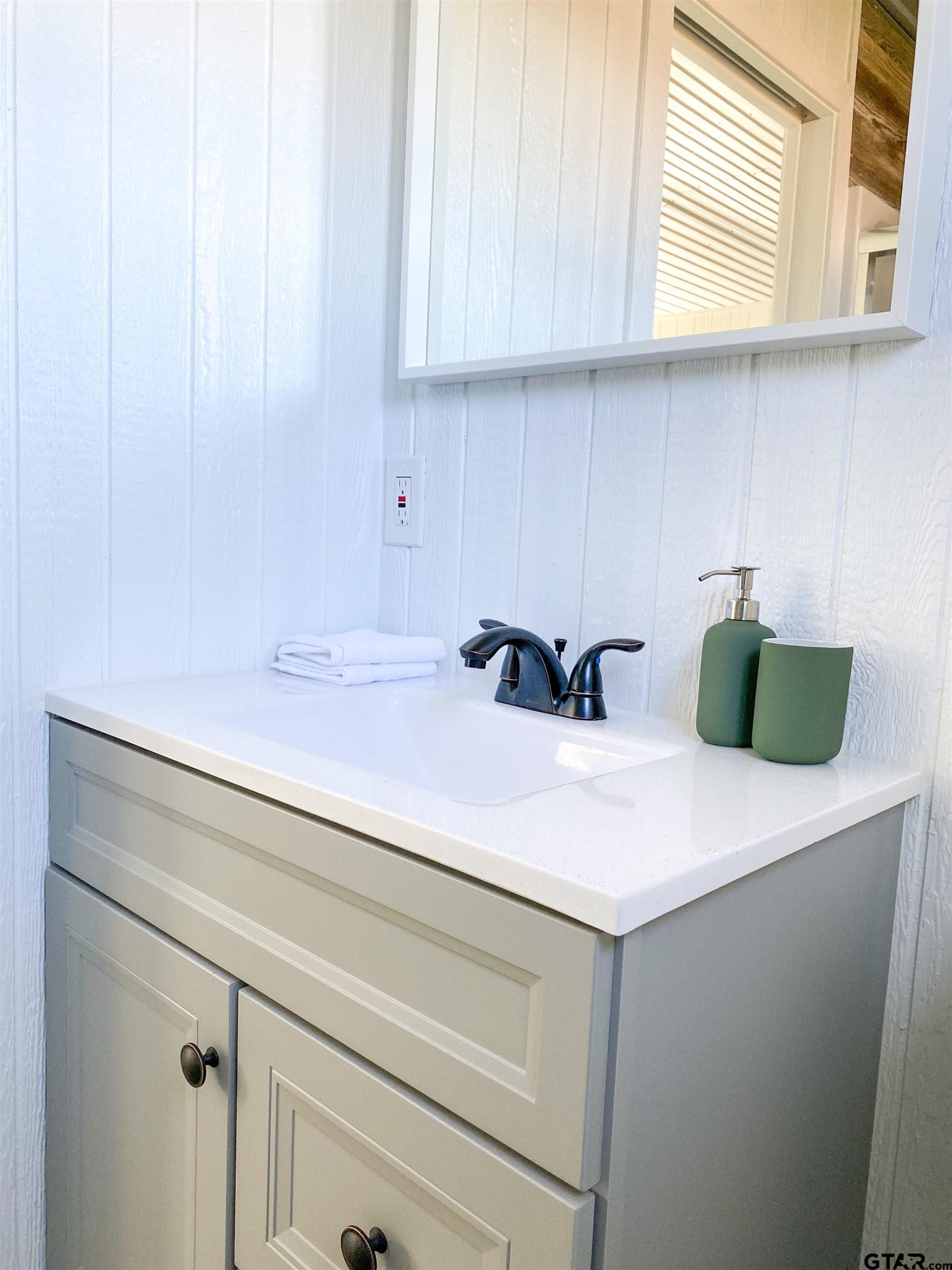 10864 State Highway 64 Overton, TX 75684 - Photo 26 of 32 a close view of sink and cabinets