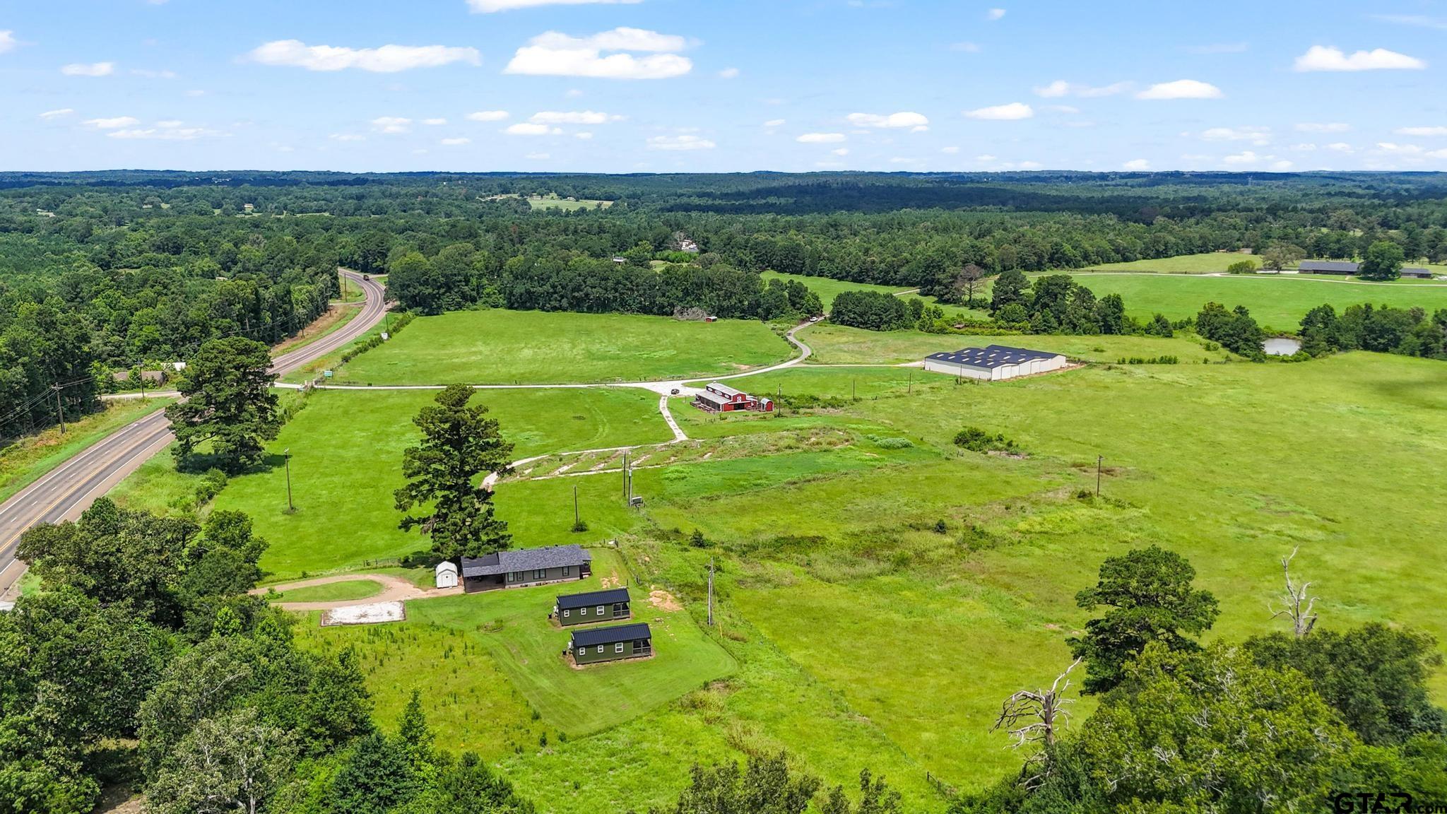 10864 State Highway 64 Overton, TX 75684 - Photo 28 of 32 a view of a lush green field