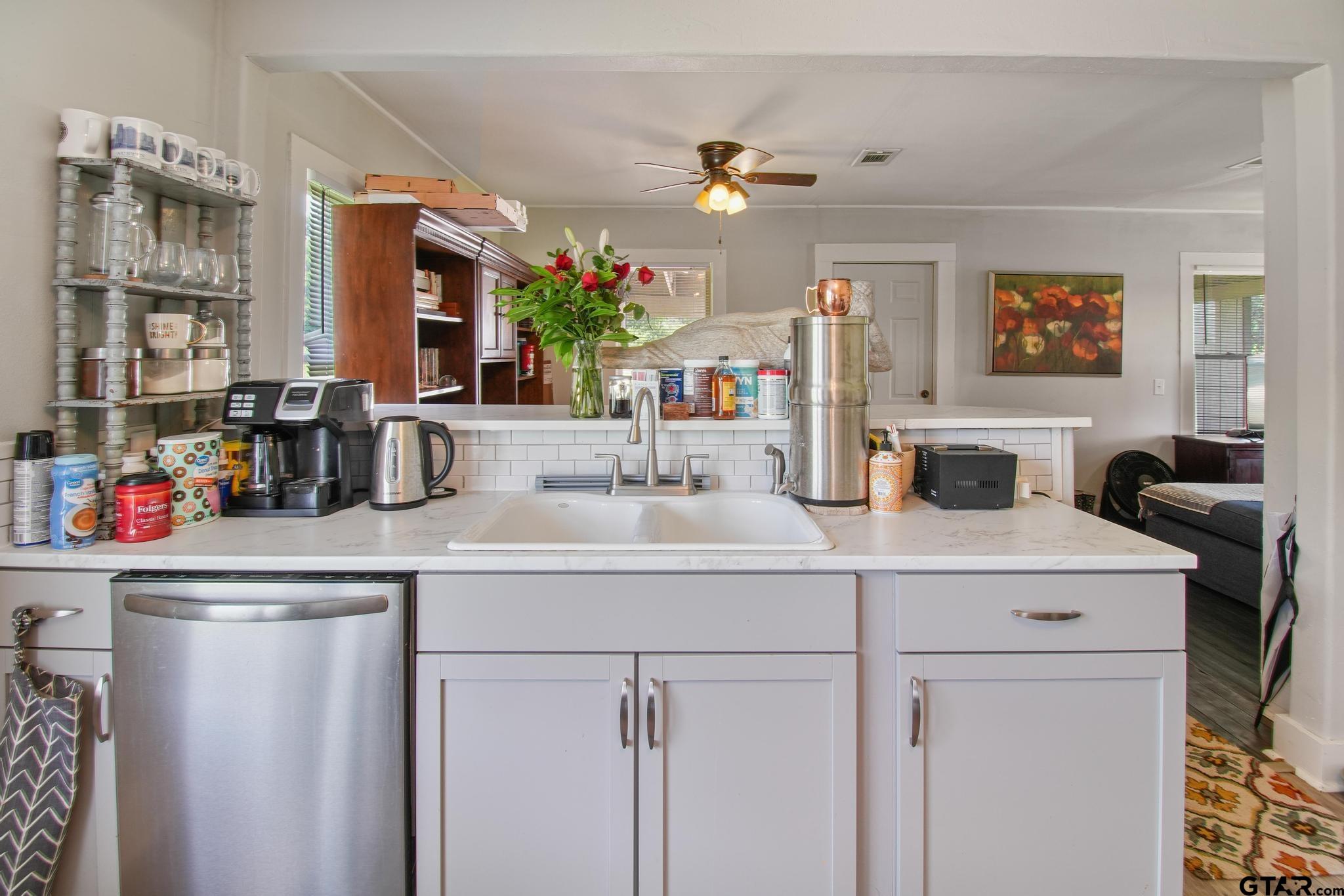10864 State Highway 64 Overton, TX 75684 - Photo 6 of 32 a bathroom with a sink and a mirror