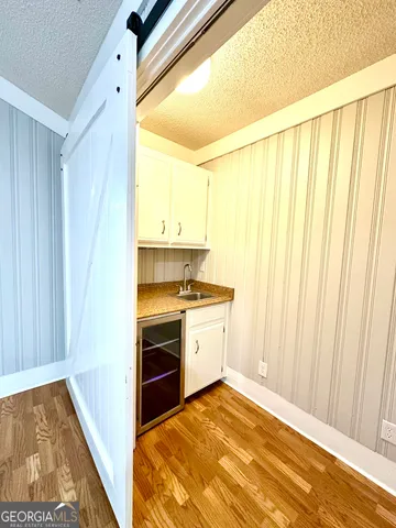 a bathroom with a sink and a window
