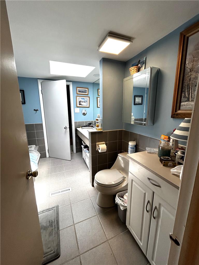 1214 Stanford Road Bethlehem, PA 18018 - Photo 53 of 58 Natural light illuminates this spacious bathroom with practical tile flooring.