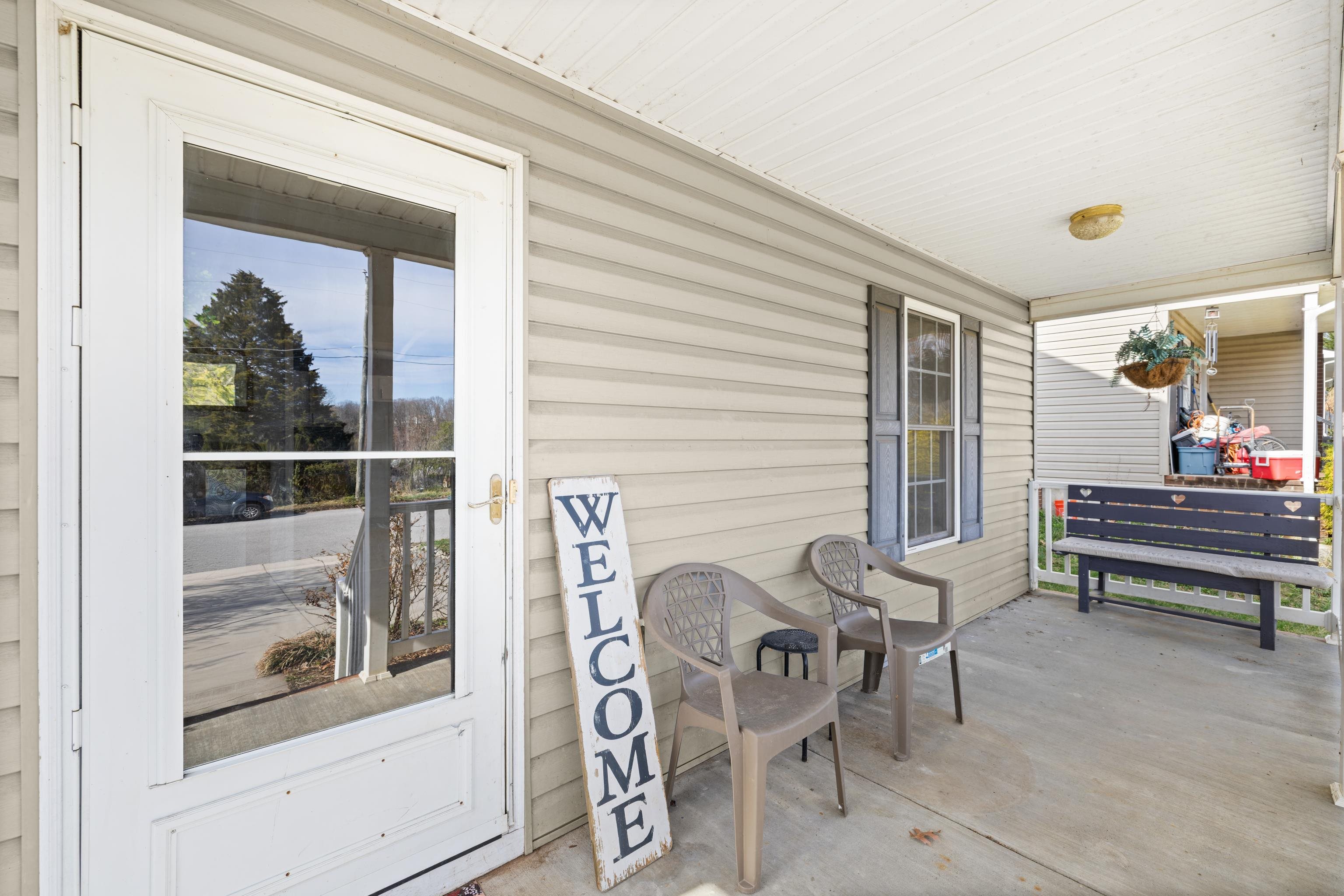 1520 3rd Street Waynesboro, VA 22980 - Photo 6 of 55 a outdoor space with a couch and a potted plant