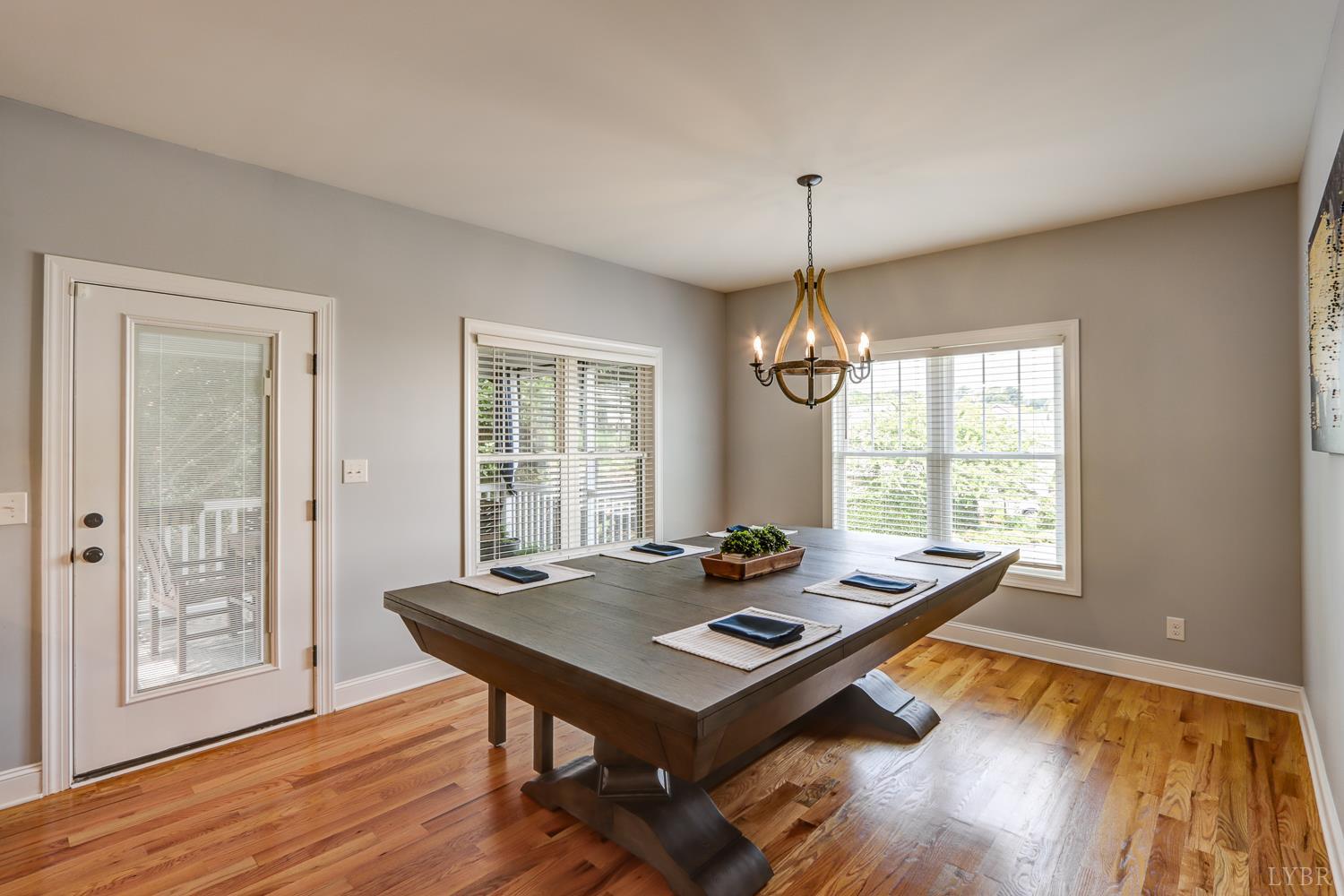 1013 Cobblestone Lane Forest, VA 24551 - Photo 13 of 49 a view of a dining room with furniture window and wooden floor