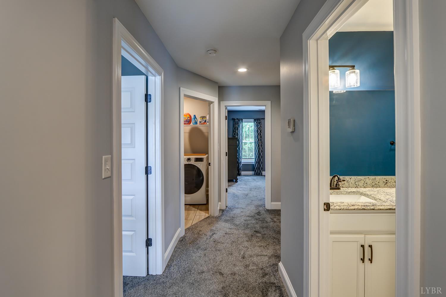 1013 Cobblestone Lane Forest, VA 24551 - Photo 24 of 49 a view of a hallway with a livingroom and a bathroom