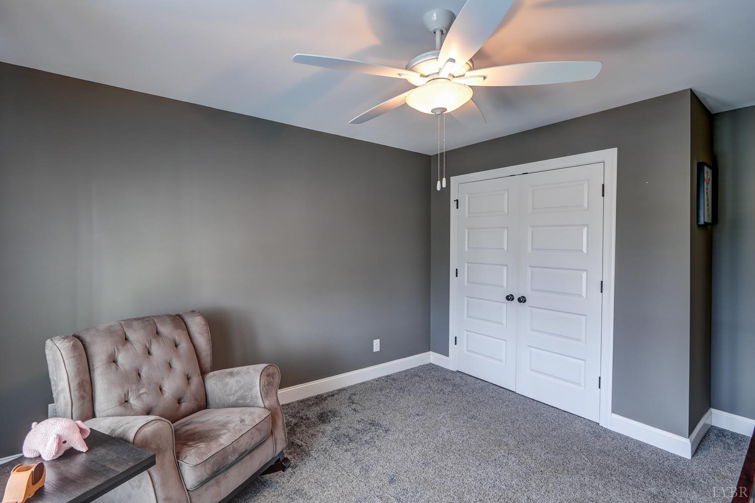 1013 Cobblestone Lane Forest, VA 24551 - Photo 30 of 49 a living room with furniture and a ceiling fan