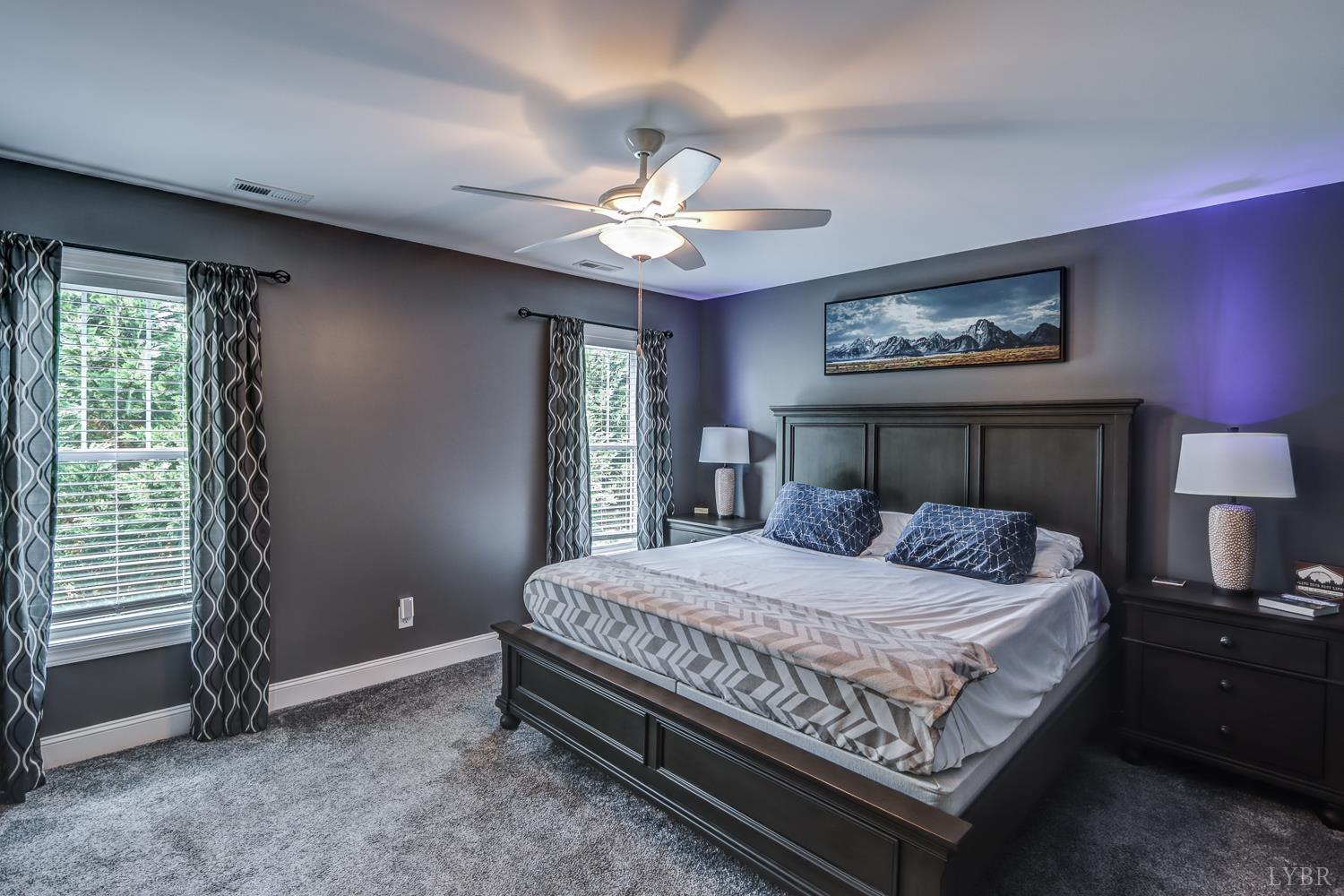 1013 Cobblestone Lane Forest, VA 24551 - Photo 33 of 49 a bedroom with a bed chandelier and a window