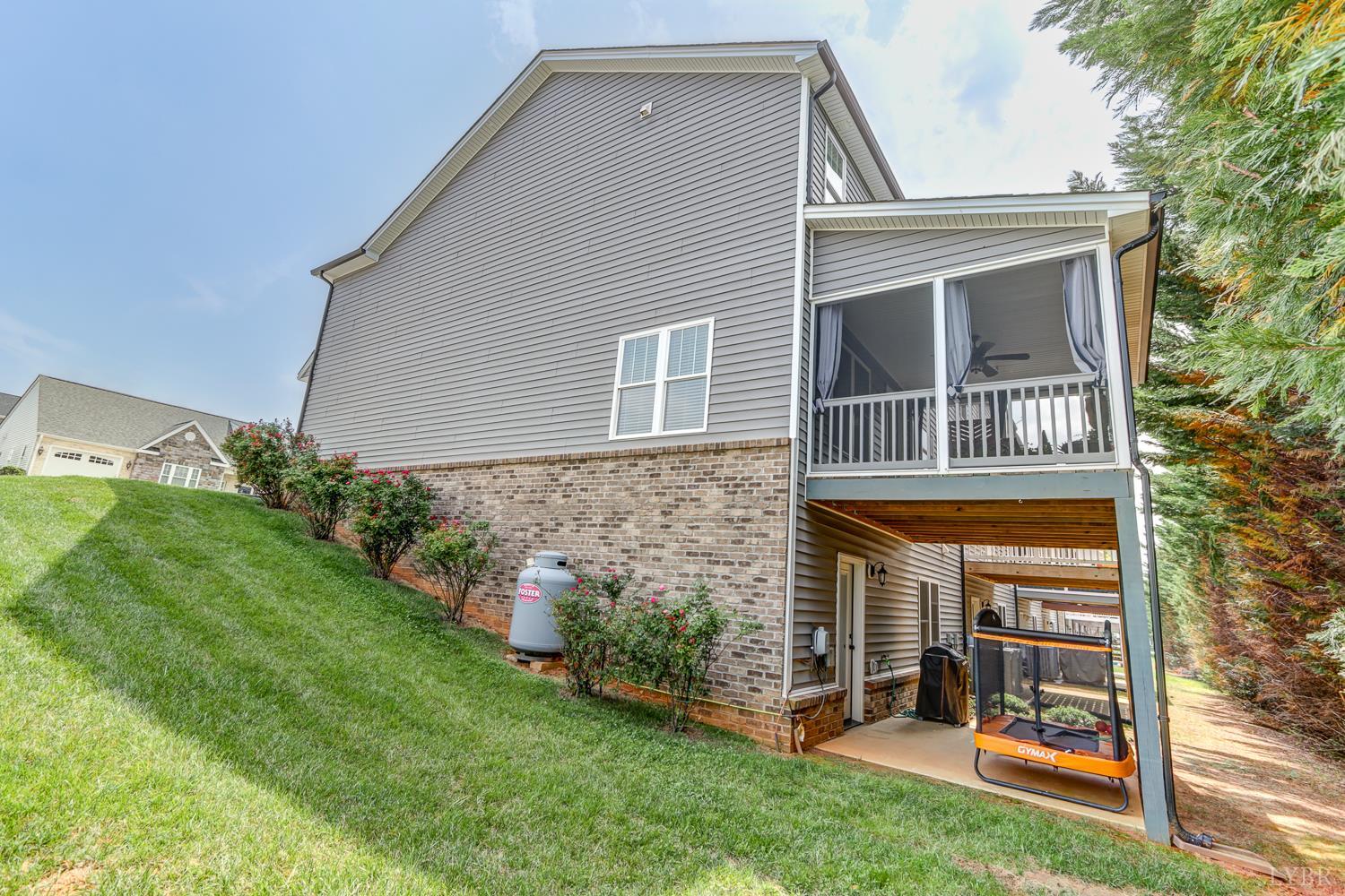 1013 Cobblestone Lane Forest, VA 24551 - Photo 45 of 49 front view of a house with a yard