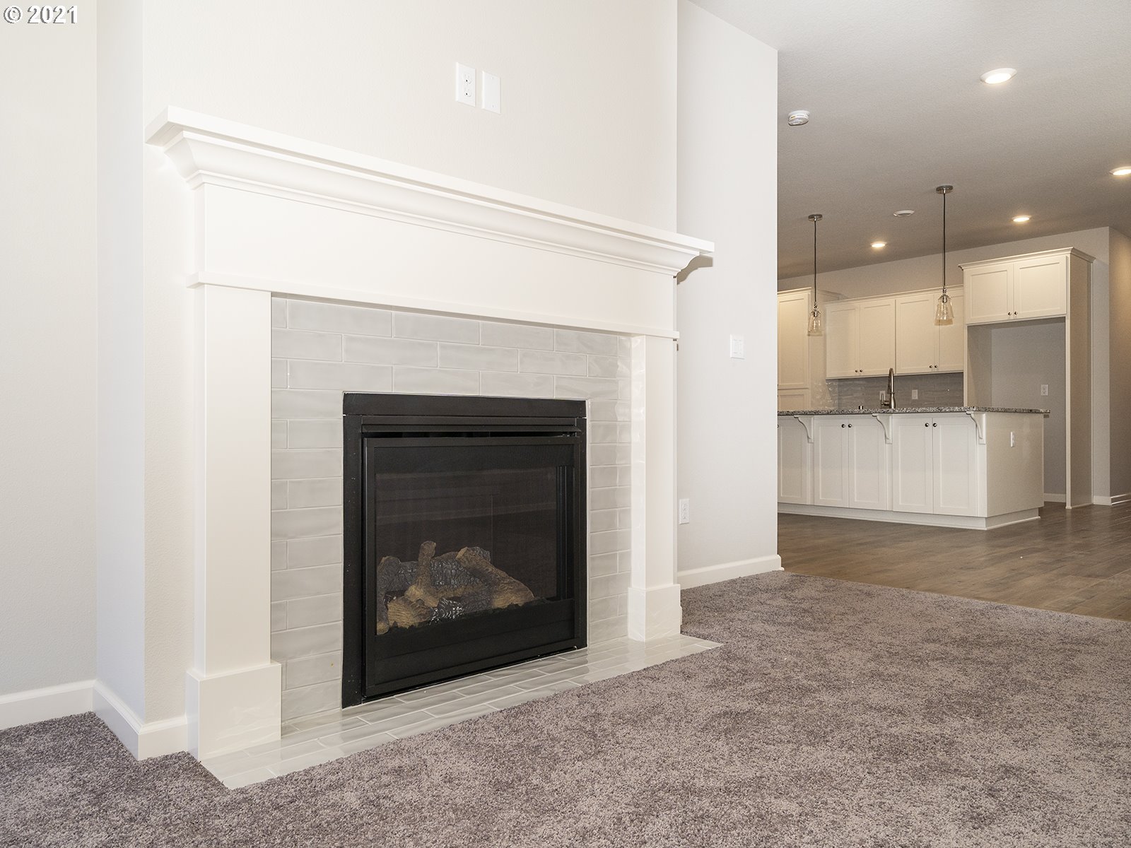 3736 South 42nd Place Ridgefield, WA 98642 - Photo 27 of 31 a view of a room that has a fireplace in it
