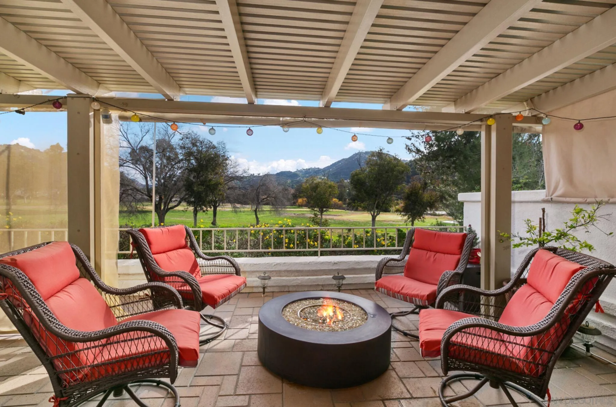 a sitting area with furniture and outdoor view
