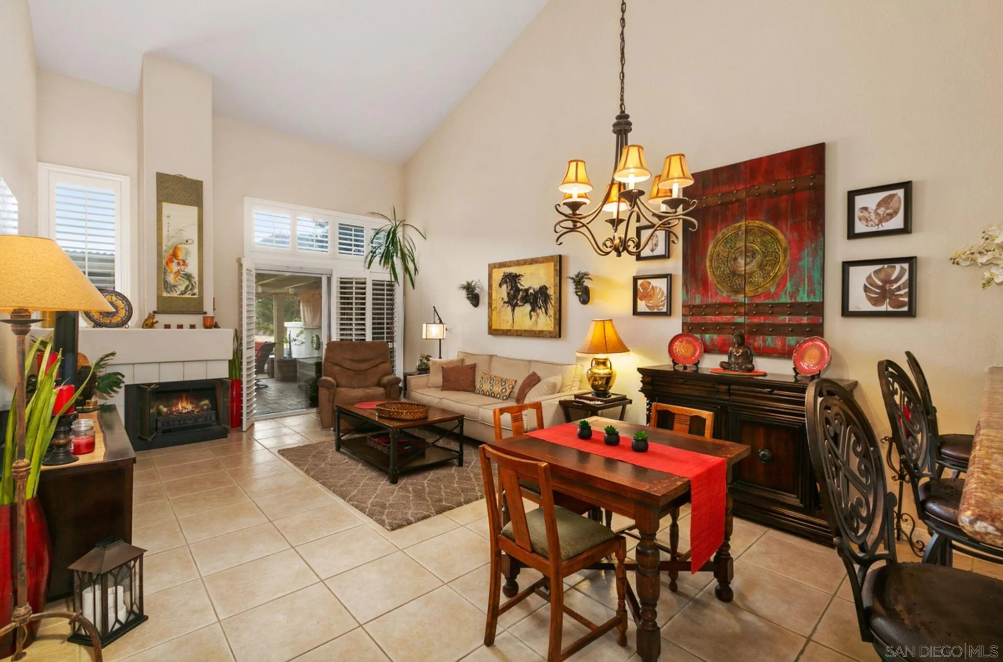 9018 Circle R Oaks Lane Escondido, CA 92026 - Photo 12 of 34 a view of a dining room and livingroom