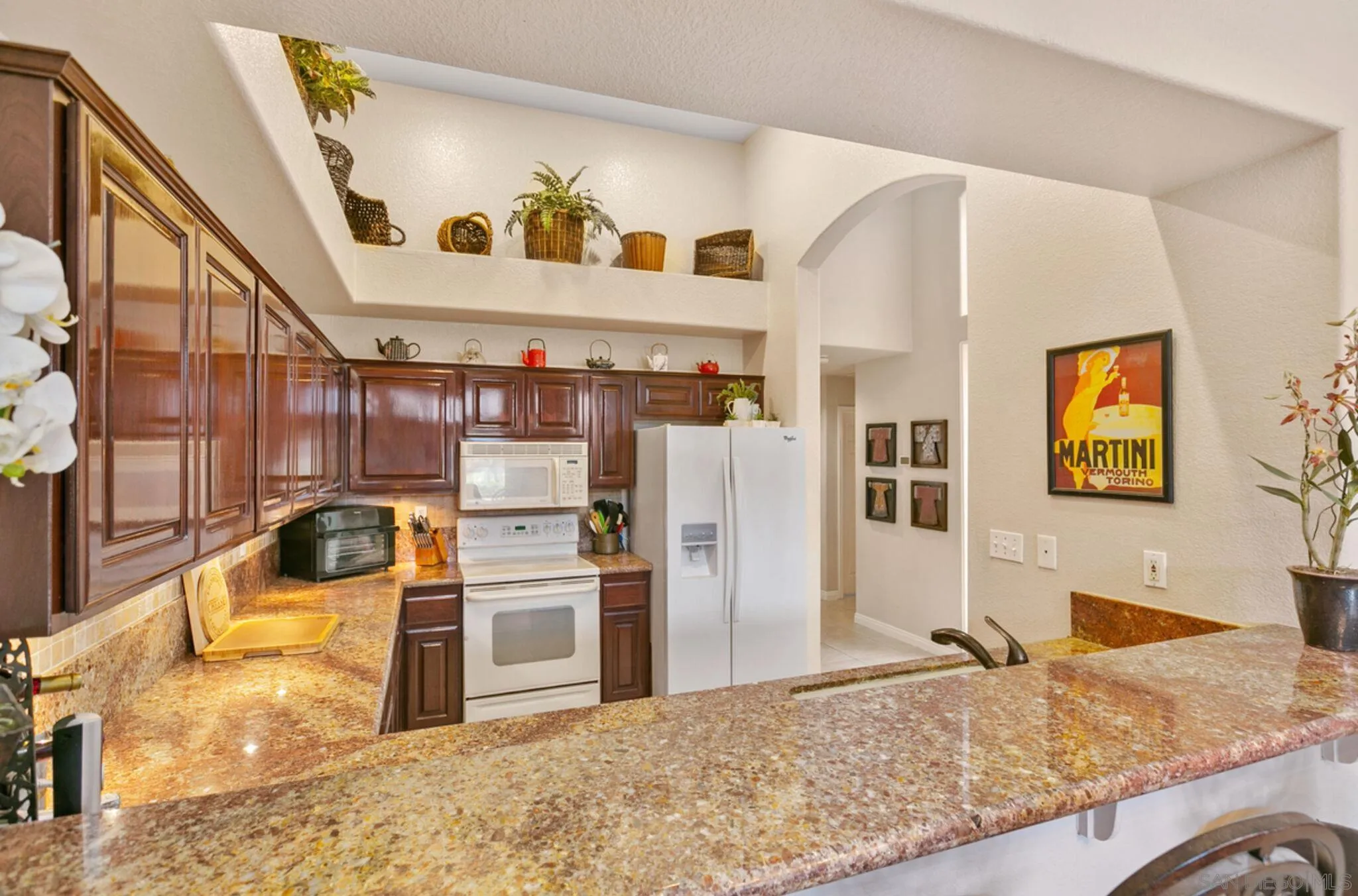 9018 Circle R Oaks Lane Escondido, CA 92026 - Photo 18 of 34 a view of a kitchen with a sink