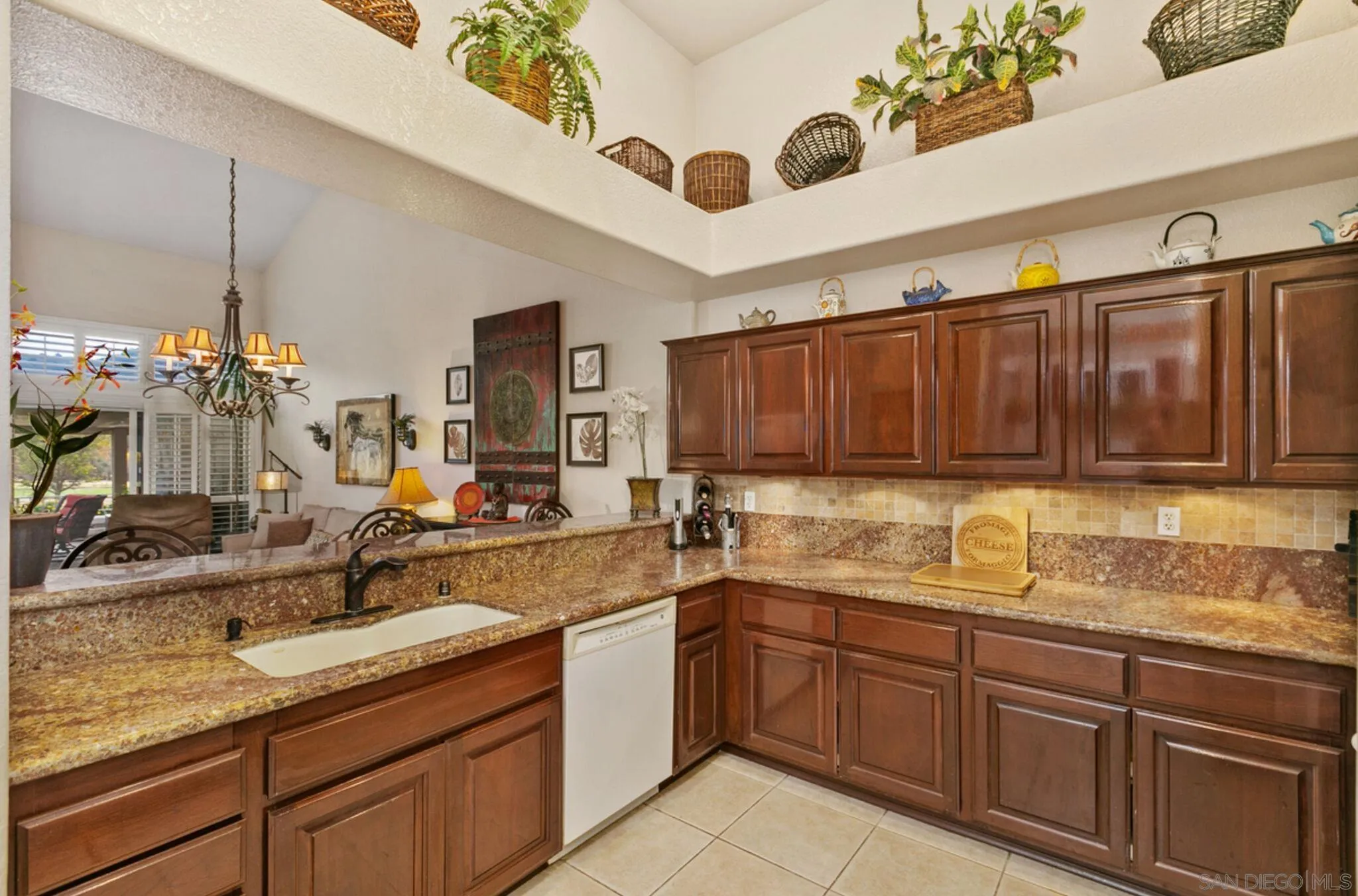9018 Circle R Oaks Lane Escondido, CA 92026 - Photo 19 of 34 a kitchen with a sink and cabinets