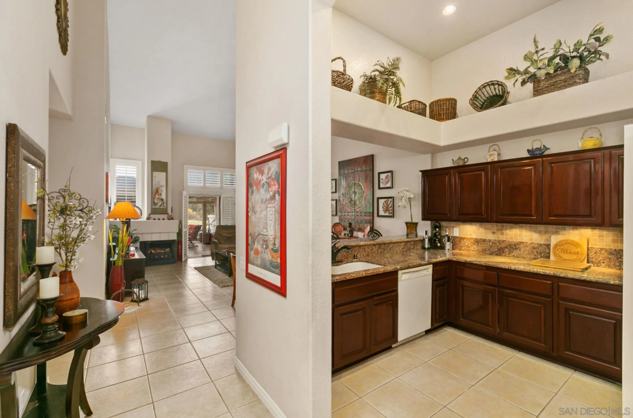 9018 Circle R Oaks Lane Escondido, CA 92026 - Photo 21 of 34 a view of a kitchen with a sink and cabinets