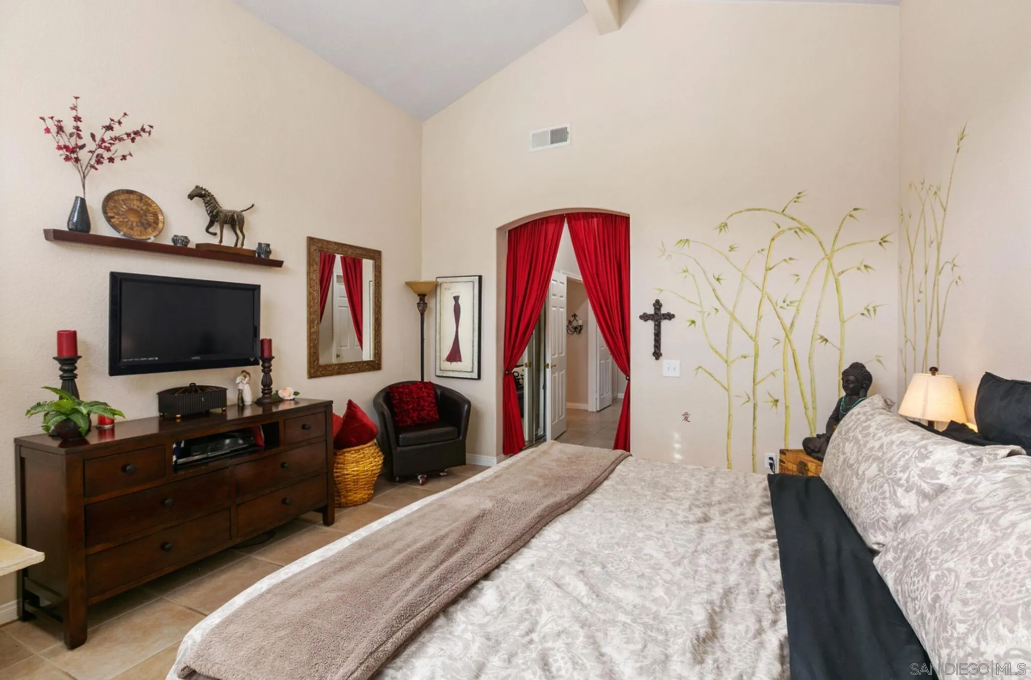 9018 Circle R Oaks Lane Escondido, CA 92026 - Photo 24 of 34 a bedroom with a bed and a flat screen tv