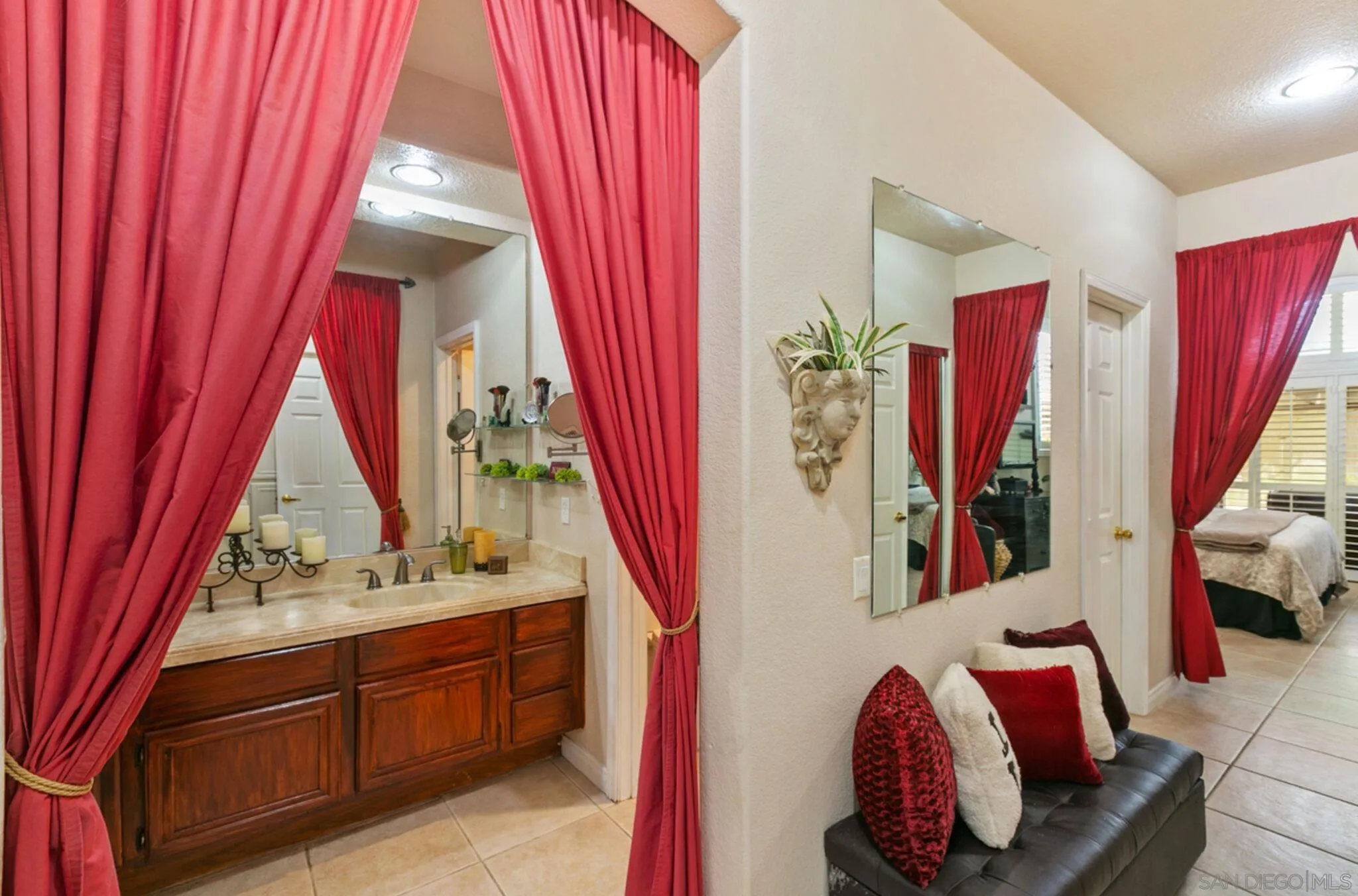 9018 Circle R Oaks Lane Escondido, CA 92026 - Photo 25 of 34 a view of walk in closet with clothes and shoes