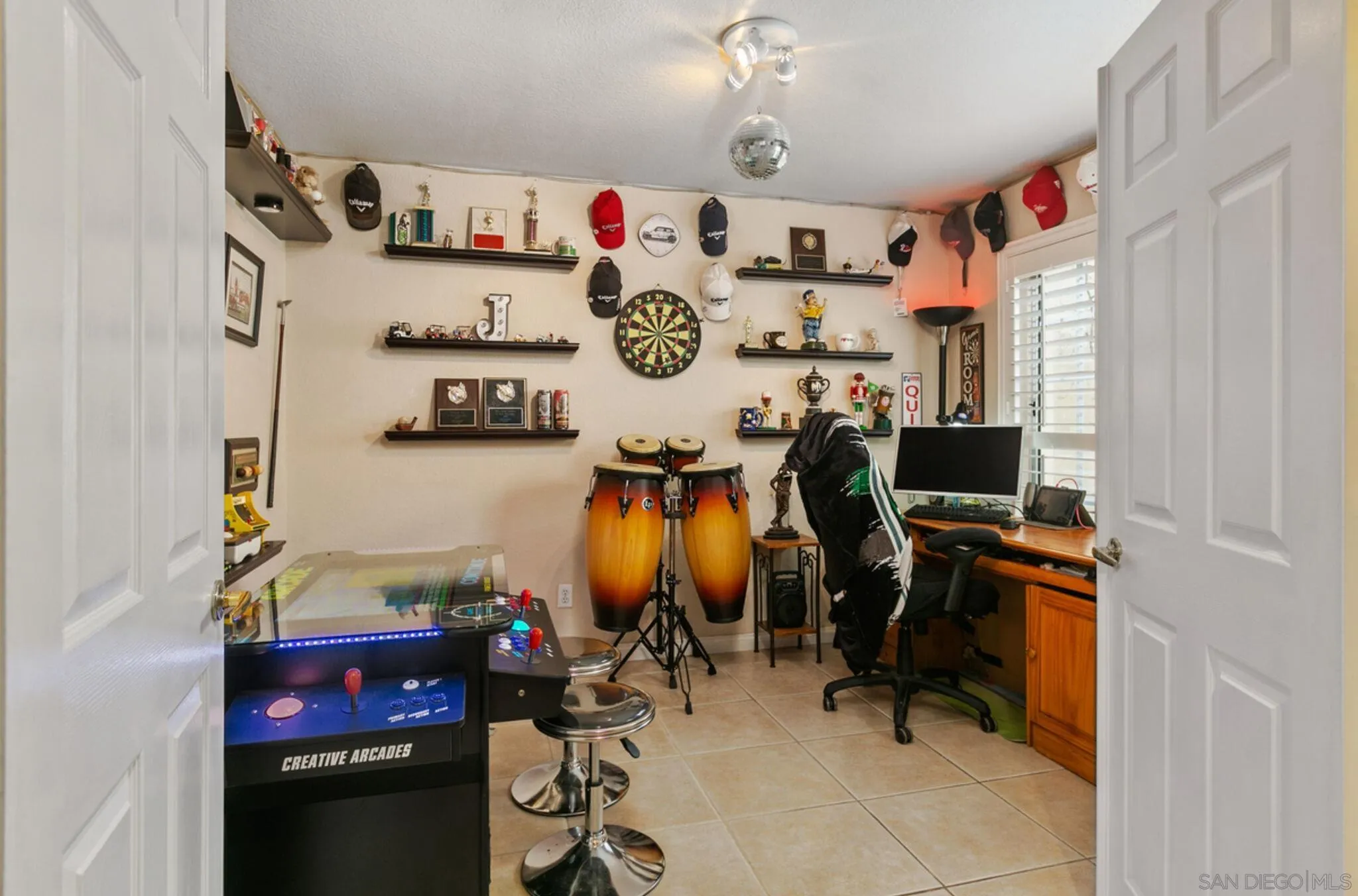 9018 Circle R Oaks Lane Escondido, CA 92026 - Photo 27 of 34 a view of entryway with workspace and toys