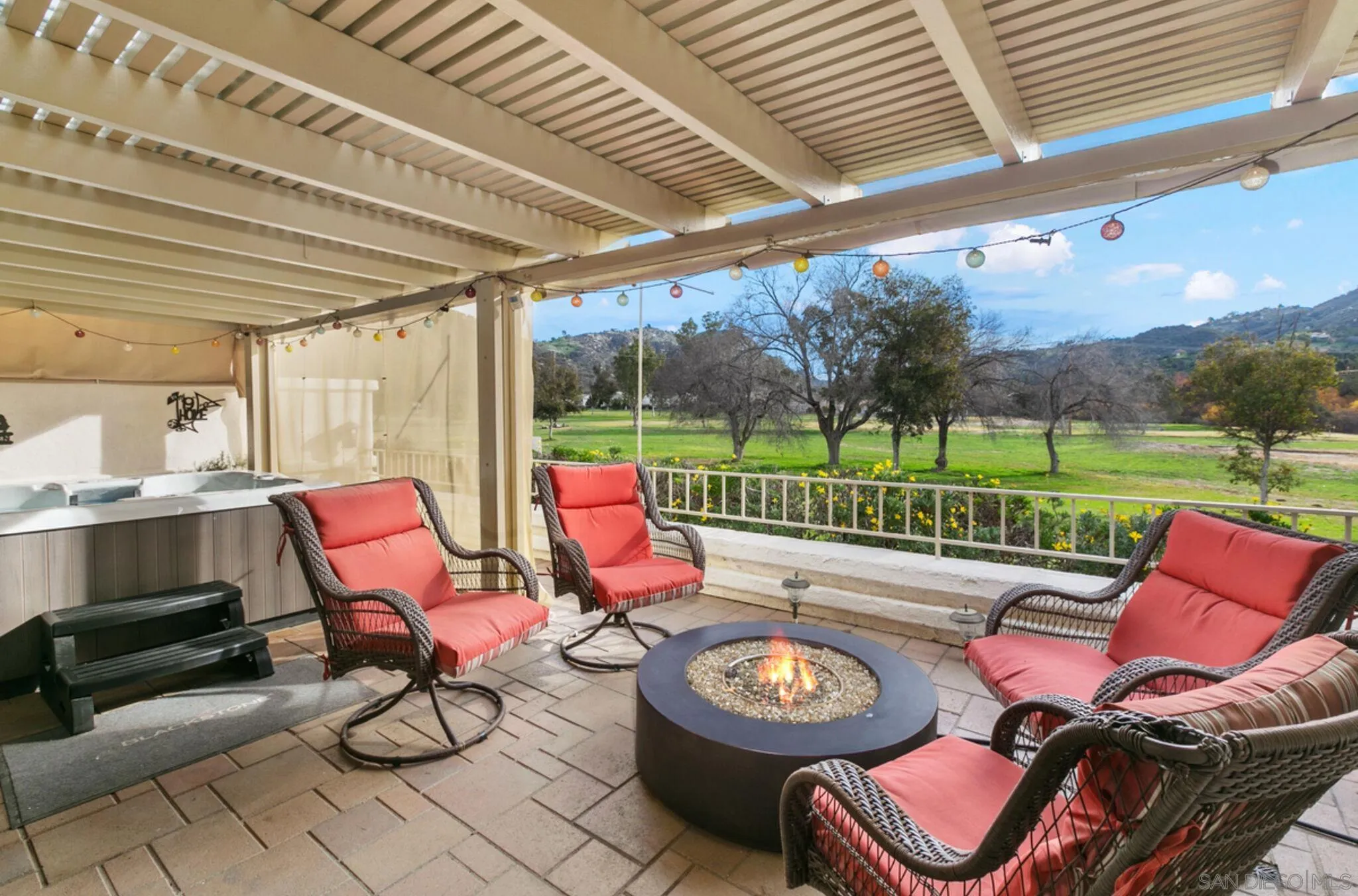 9018 Circle R Oaks Lane Escondido, CA 92026 - Photo 3 of 34 a sitting area with furniture and garden view
