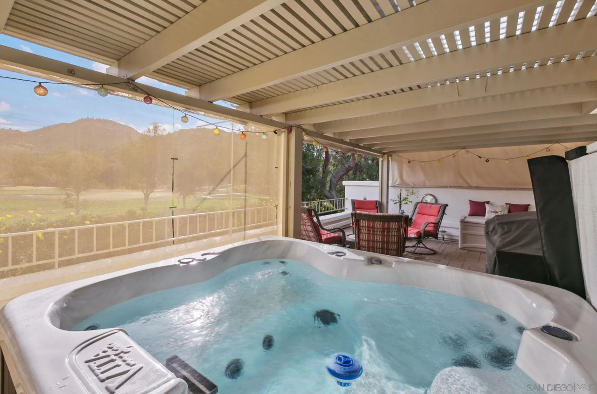9018 Circle R Oaks Lane Escondido, CA 92026 - Photo 31 of 34 a view of a room with furniture and a chandelier