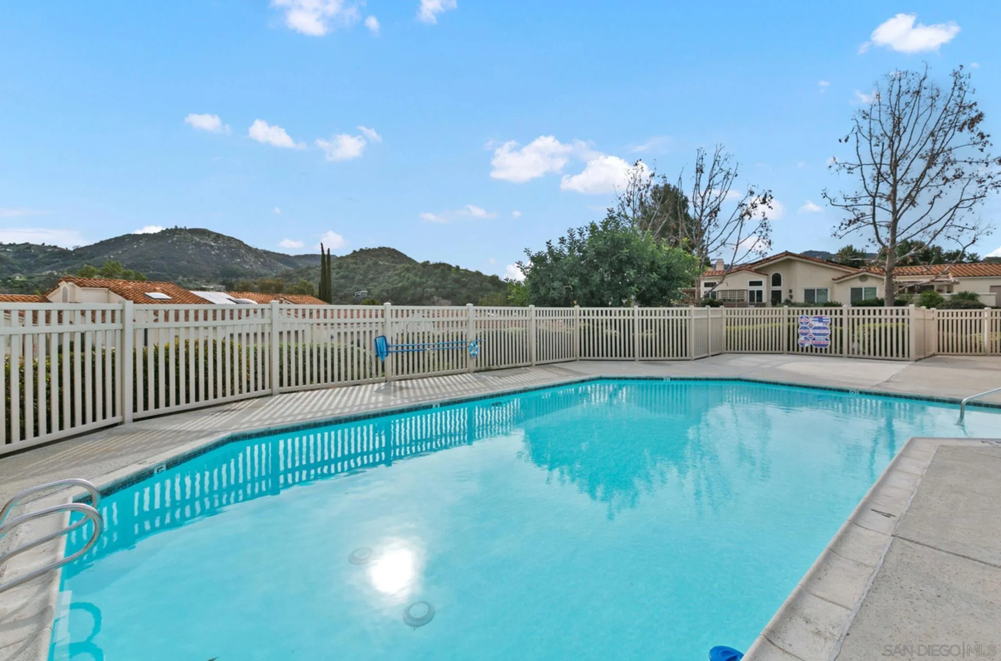 9018 Circle R Oaks Lane Escondido, CA 92026 - Photo 33 of 34 a view of a terrace with a lake view