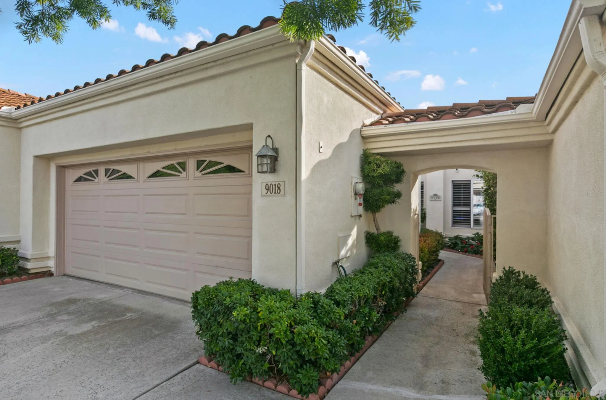 9018 Circle R Oaks Lane Escondido, CA 92026 - Photo 8 of 34 front view of a house with a small porch