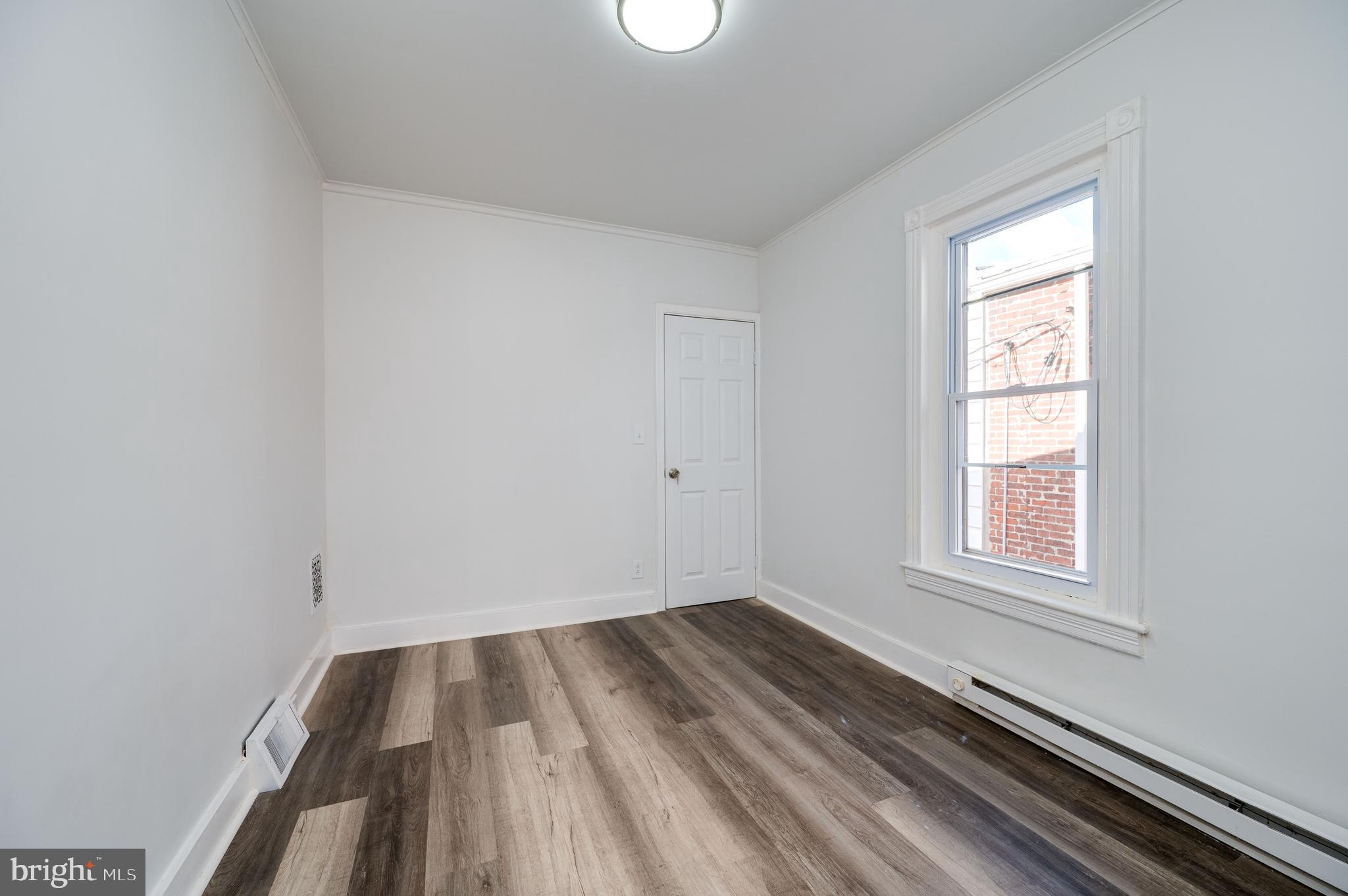 2024 Kutztown Road Reading, PA 19605 - Photo 16 of 38 a view of a room with wooden floor and windows