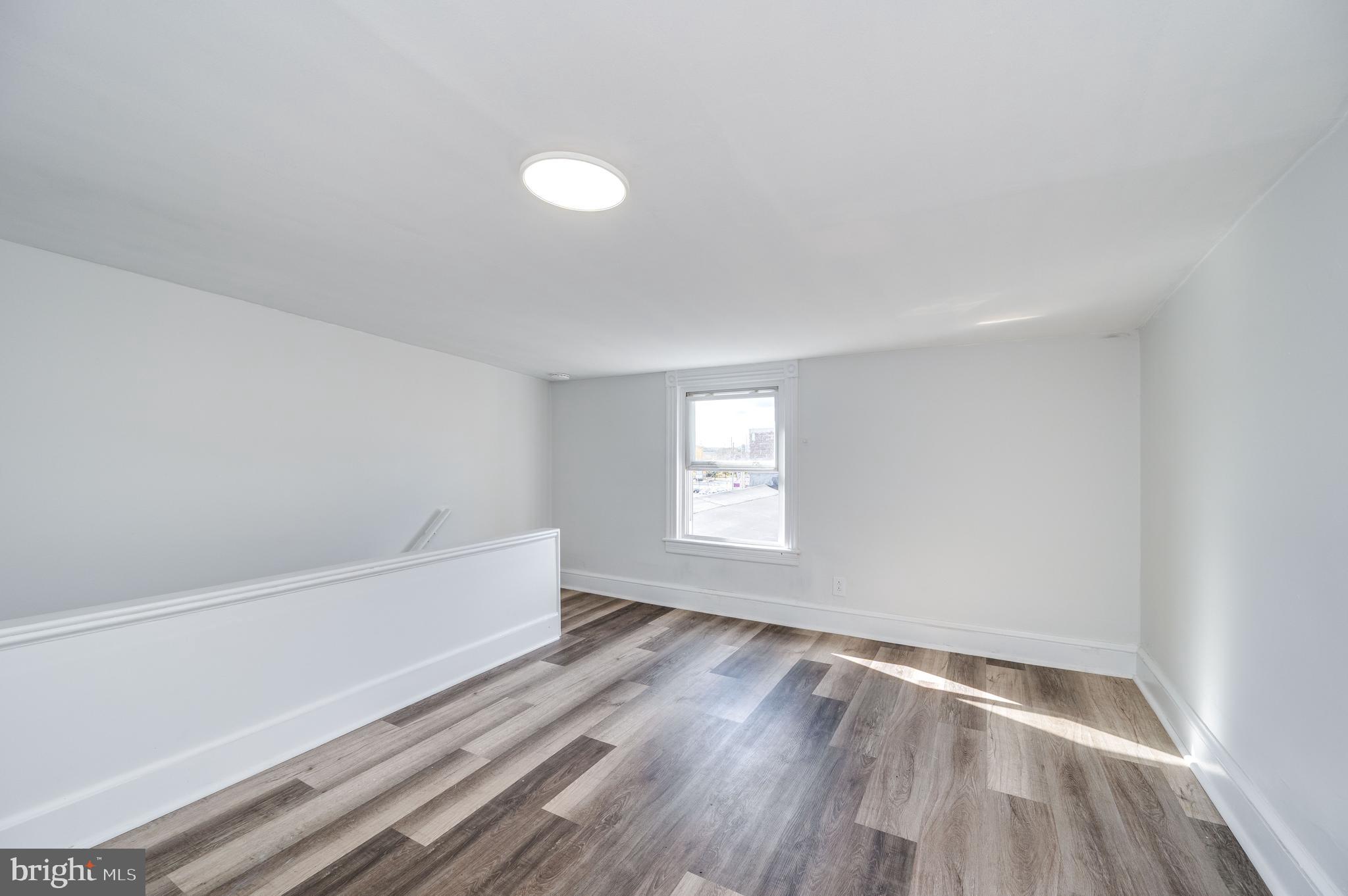 2024 Kutztown Road Reading, PA 19605 - Photo 29 of 38 a view of room with window and hardwood floor