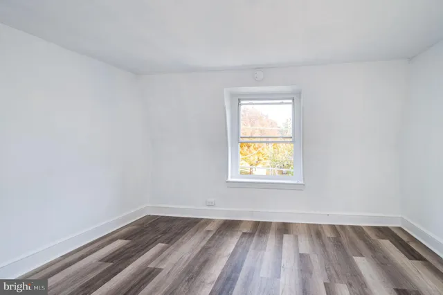 a view of a room that has a window in it