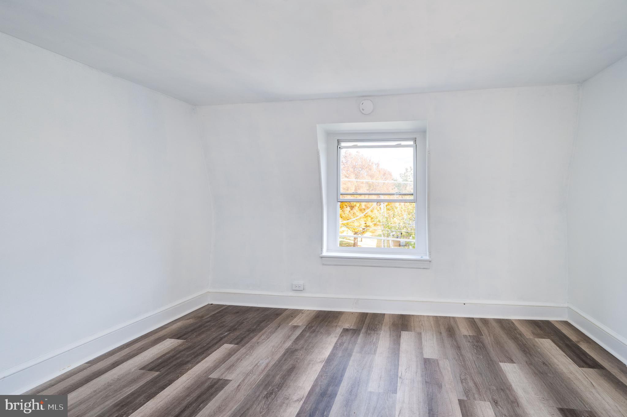 2024 Kutztown Road Reading, PA 19605 - Photo 30 of 38 an empty room with a window
