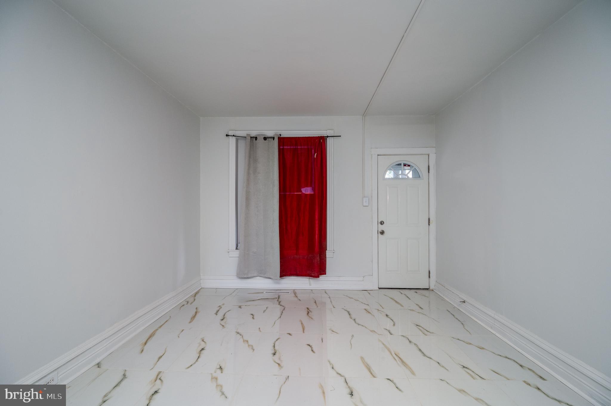 2024 Kutztown Road Reading, PA 19605 - Photo 3 of 38 a view of a room with wooden floor and bathroom