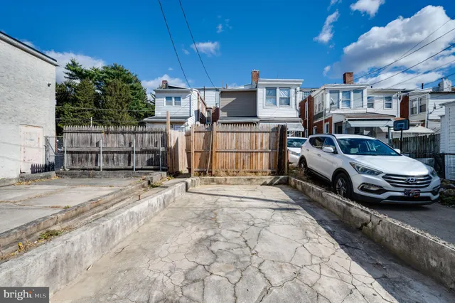 a view of a balcony with wooden floor