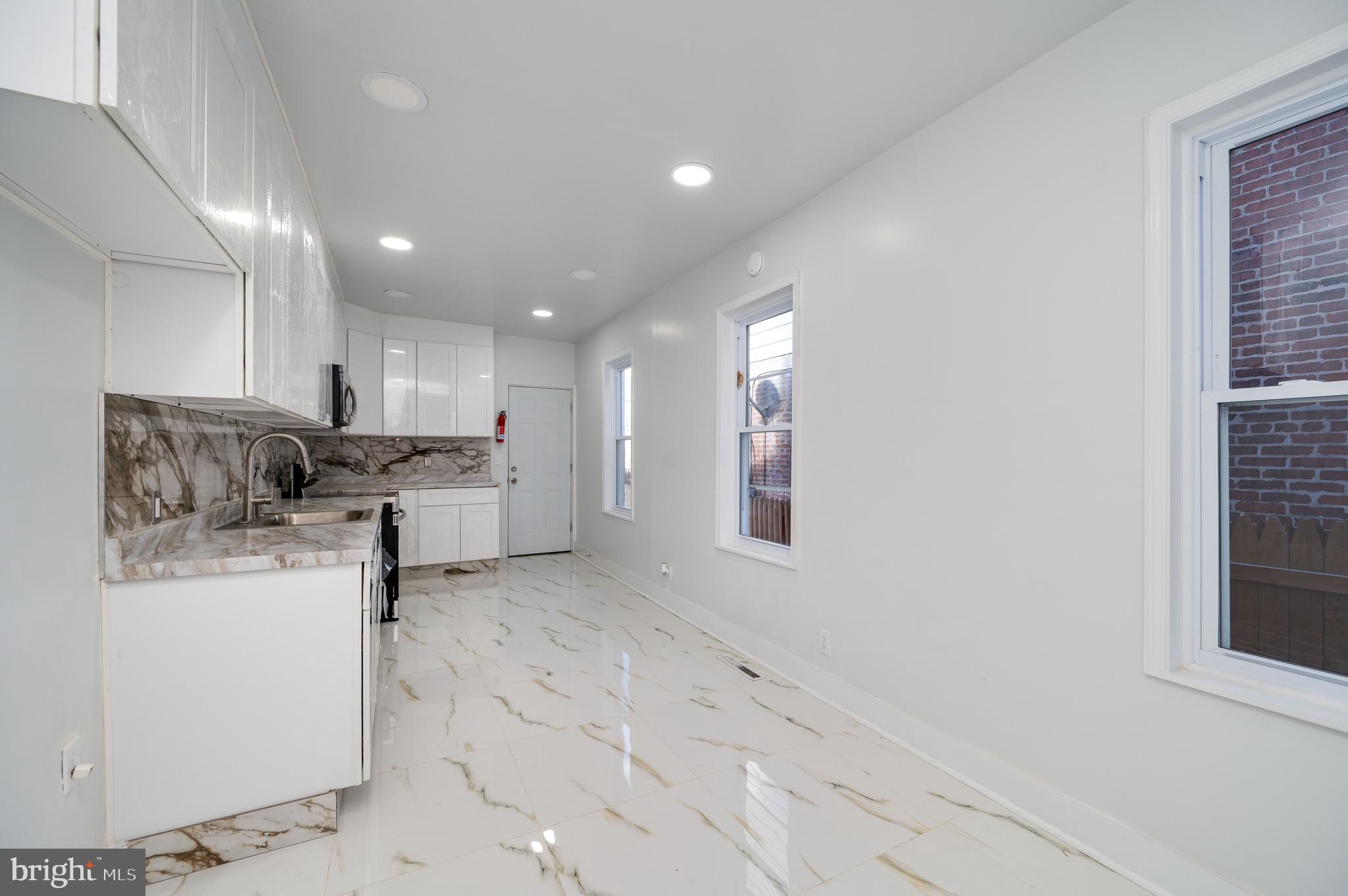 2024 Kutztown Road Reading, PA 19605 - Photo 9 of 38 a living room with furniture and a window