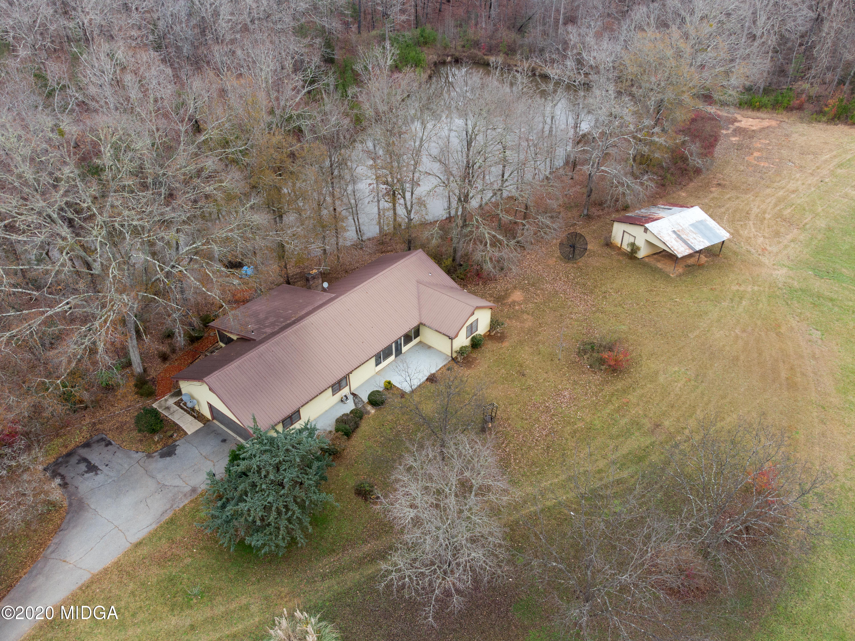 115 Hasty Road Jackson, GA 30233 - Photo 2 of 36 an aerial view of a house with a yard
