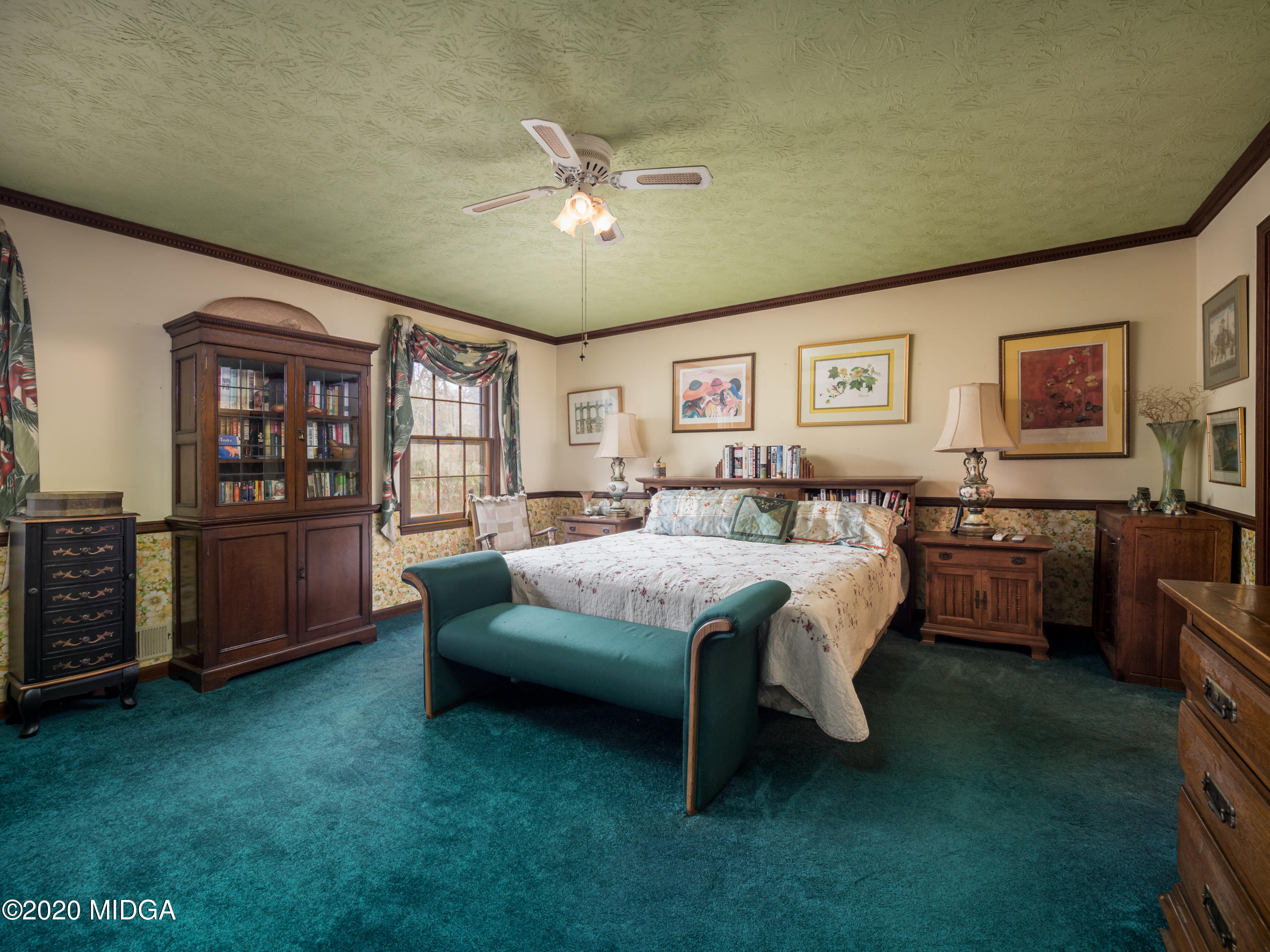 115 Hasty Road Jackson, GA 30233 - Photo 18 of 36 a bed room with a bed and furniture