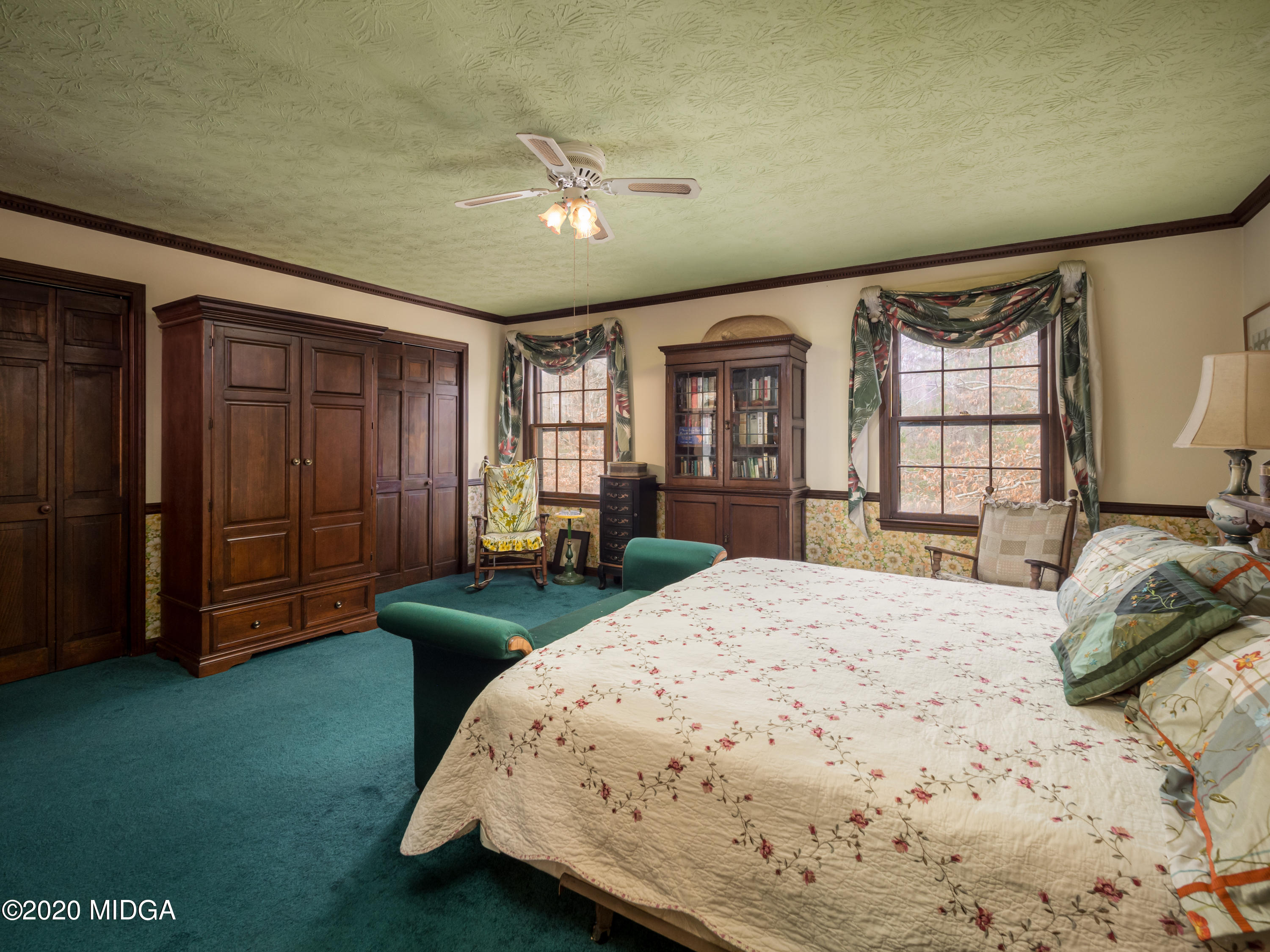 115 Hasty Road Jackson, GA 30233 - Photo 20 of 36 a bedroom with a bed and a dresser