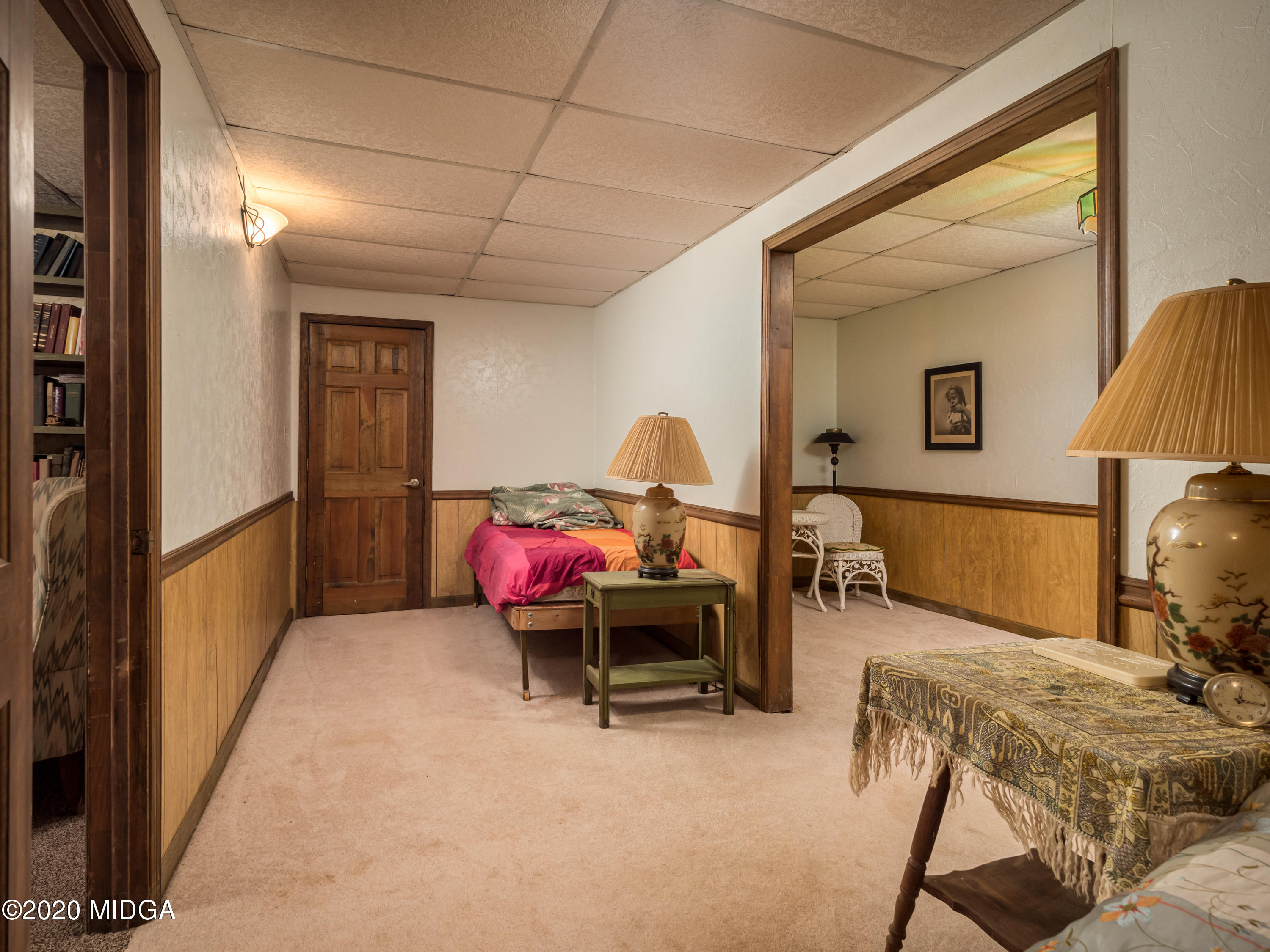 115 Hasty Road Jackson, GA 30233 - Photo 27 of 36 a bedroom with furniture and a lamp