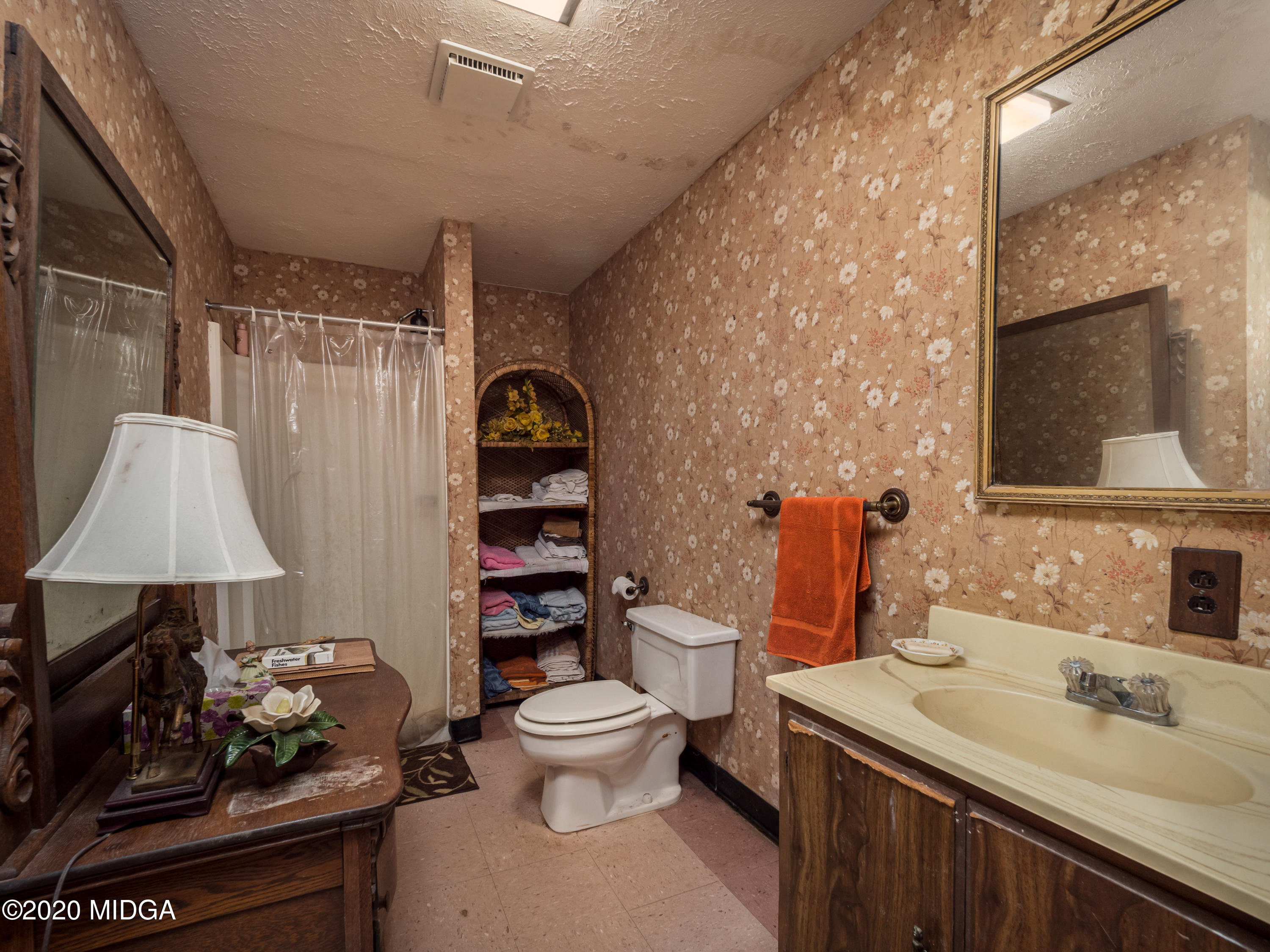 115 Hasty Road Jackson, GA 30233 - Photo 31 of 36 a bathroom with a sink toilet and shower