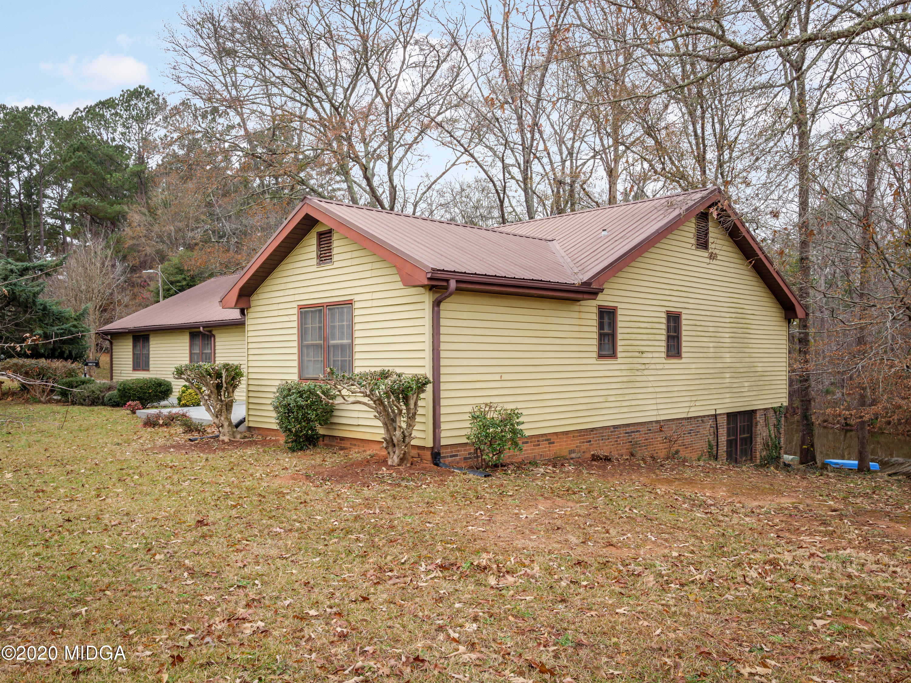 115 Hasty Road Jackson, GA 30233 - Photo 35 of 36 a view of house with backyard and chairs