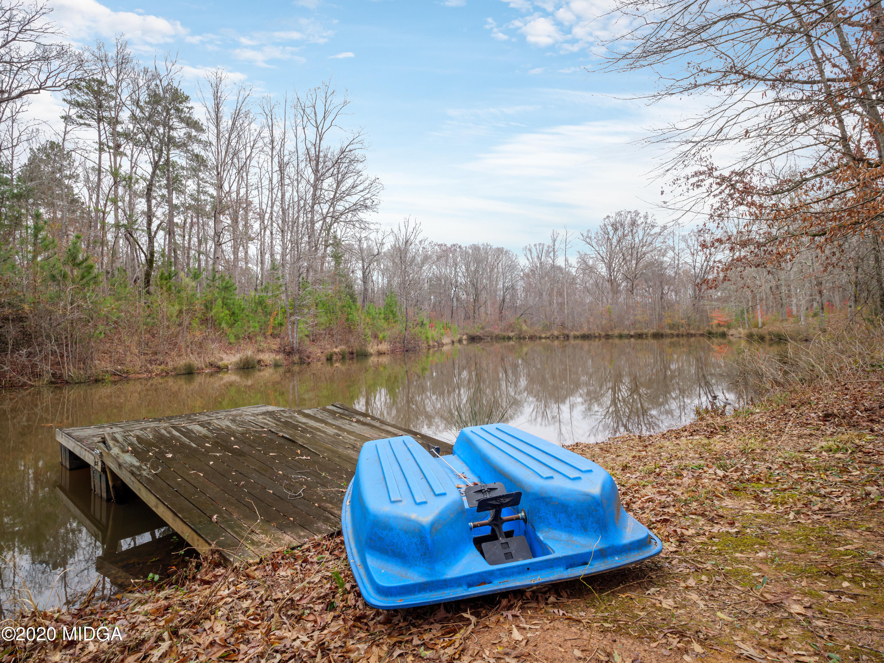 115 Hasty Road Jackson, GA 30233 - Photo 5 of 36 a view of a lake with a yard