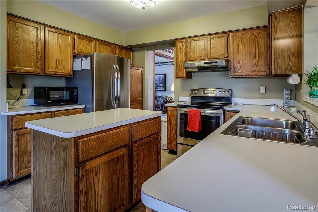 453 Mayapple Court Rochester, MI 48307 - Photo 12 of 37 Another view of Kitchen with plenty of storage cabinets
