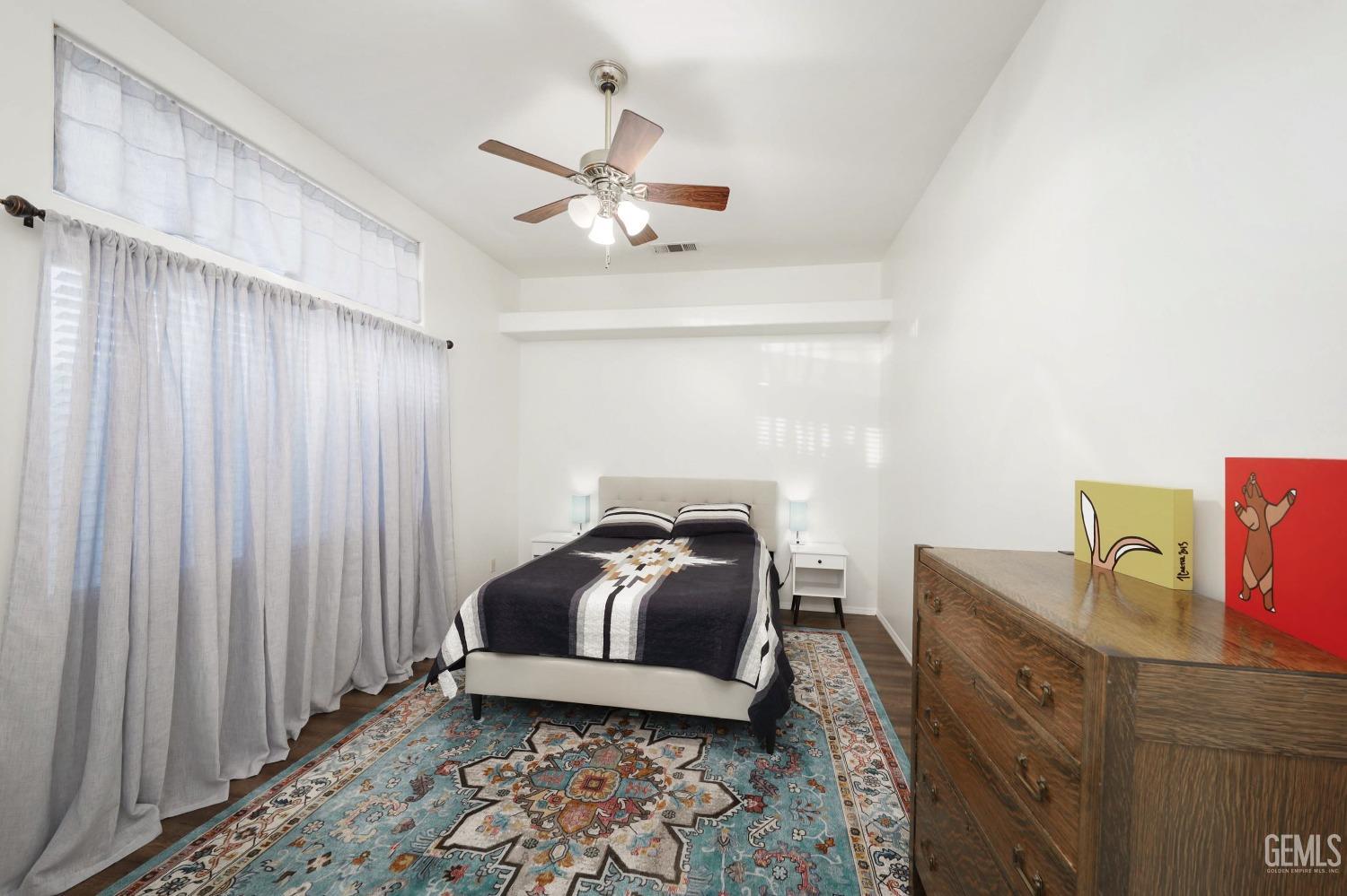 Undisclosed Address Bakersfield, CA 93312 - Photo 17 of 39 a living room with furniture